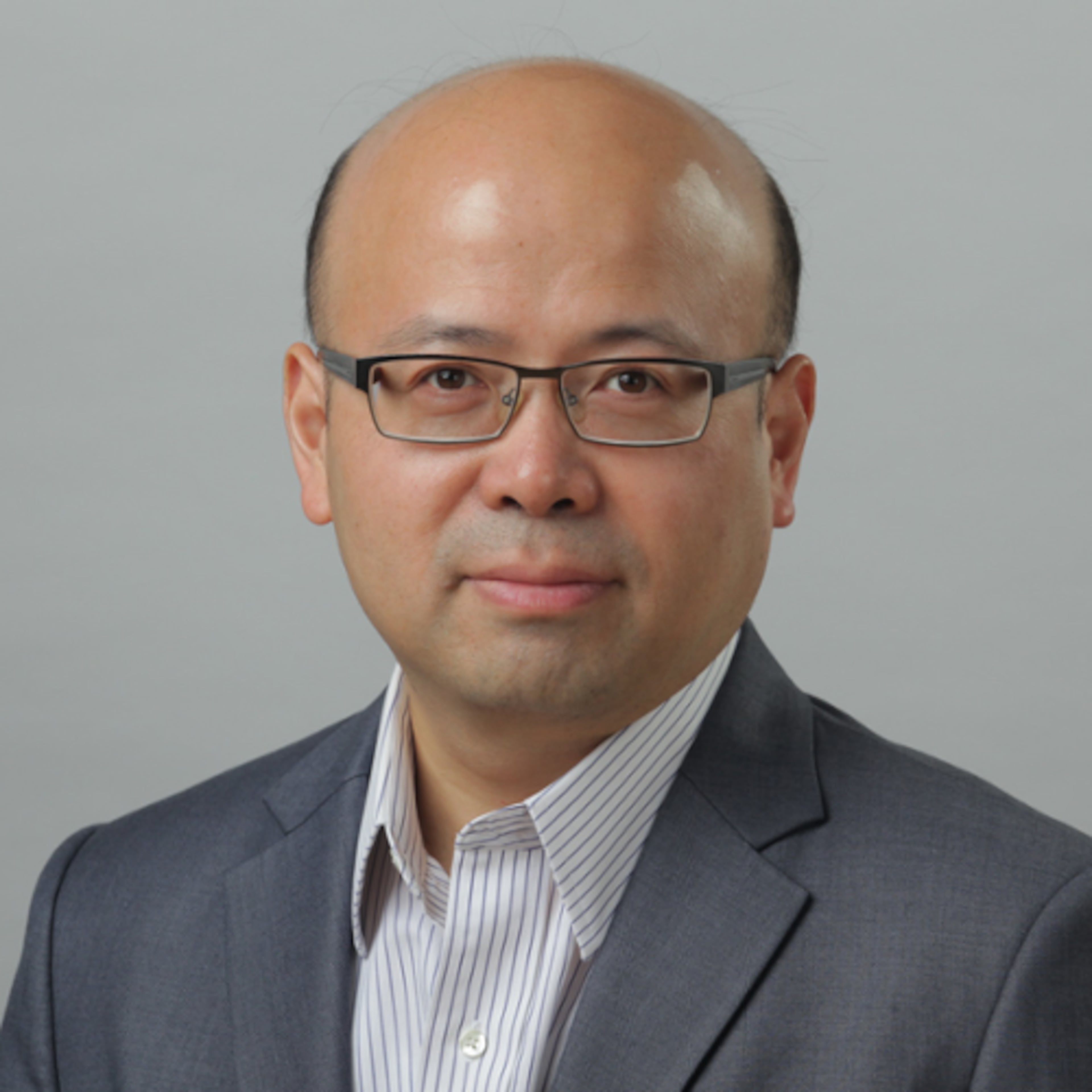 Tariffs "will impact the price level and the real effective income of households,” says Kaiji Chen, professor of economics, Emory University. (Courtesy of Emory University)