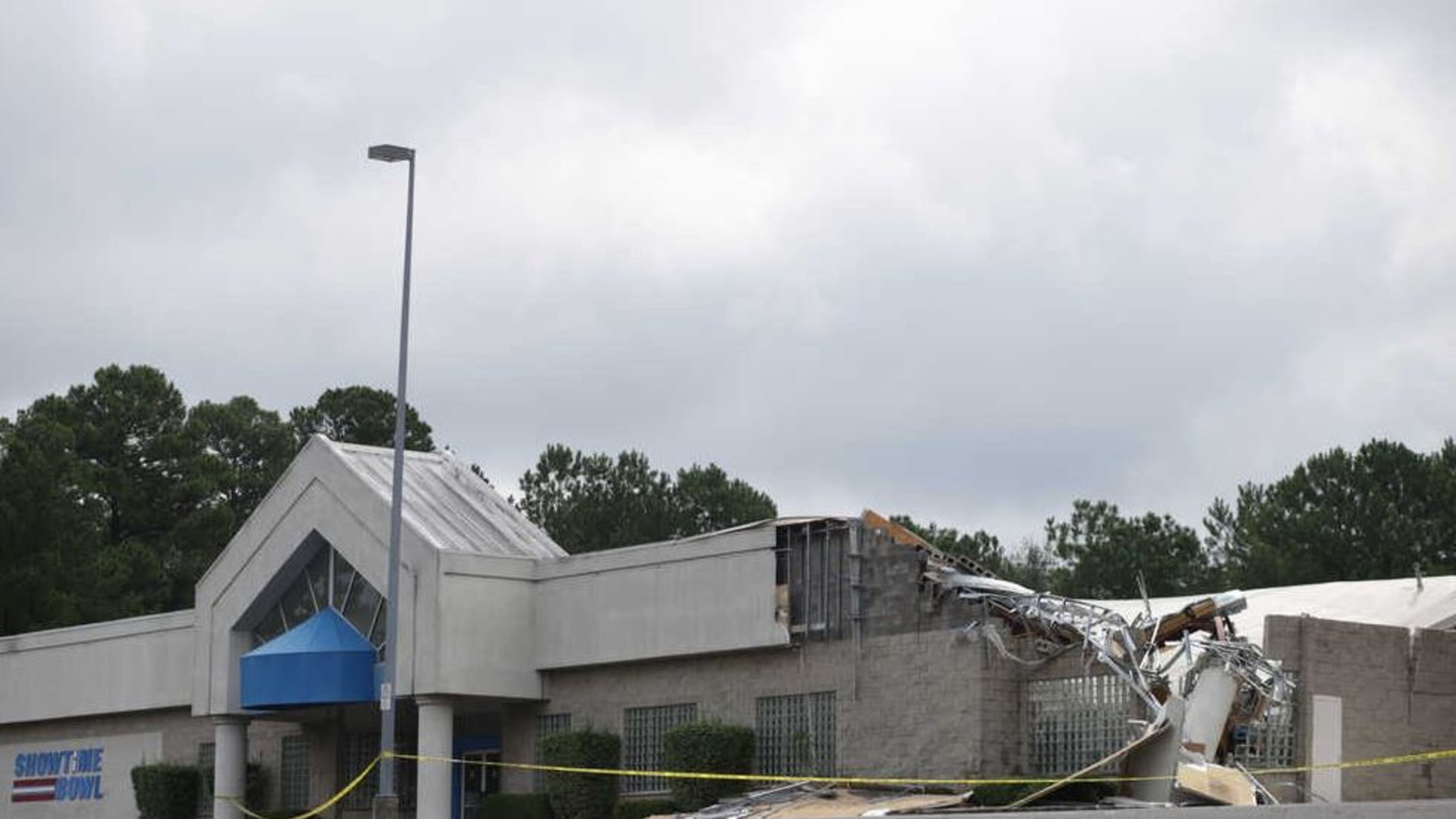 The Showtime Bowling Center’s roof caved around 10 p.m. Thursday due to heavy rain. (Credit: Athens Banner-Herald)