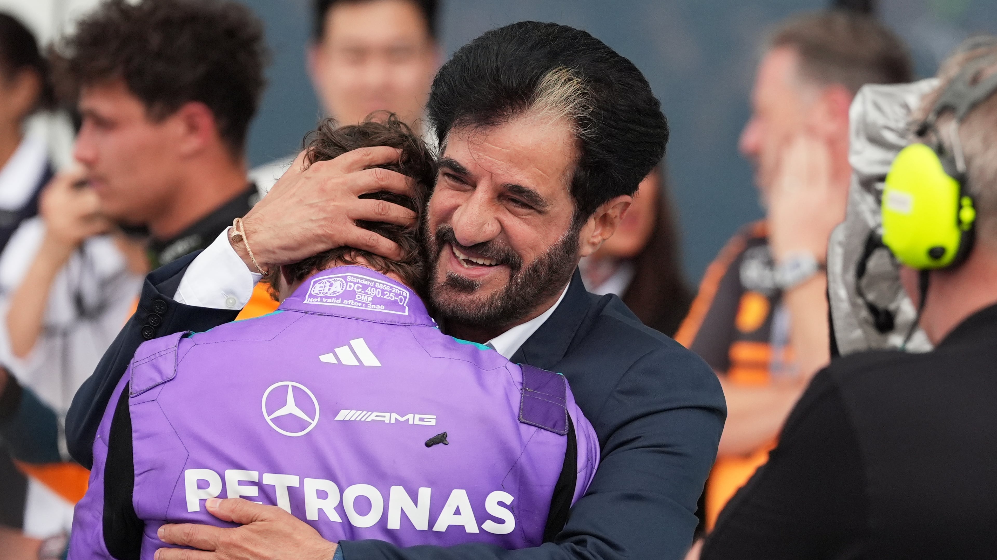 Mohammed Ben Sulayem President of the Federation Internationale de l'Automobile (FIA) hugs Mercedes driver Kimi Antonelli of Italy after Antonelli won the Miami Formula One Grand Prix auto race, Sunday, May 3, 2026, in Miami Gardens, Fla. (AP Photo/Rebecca Blackwell)