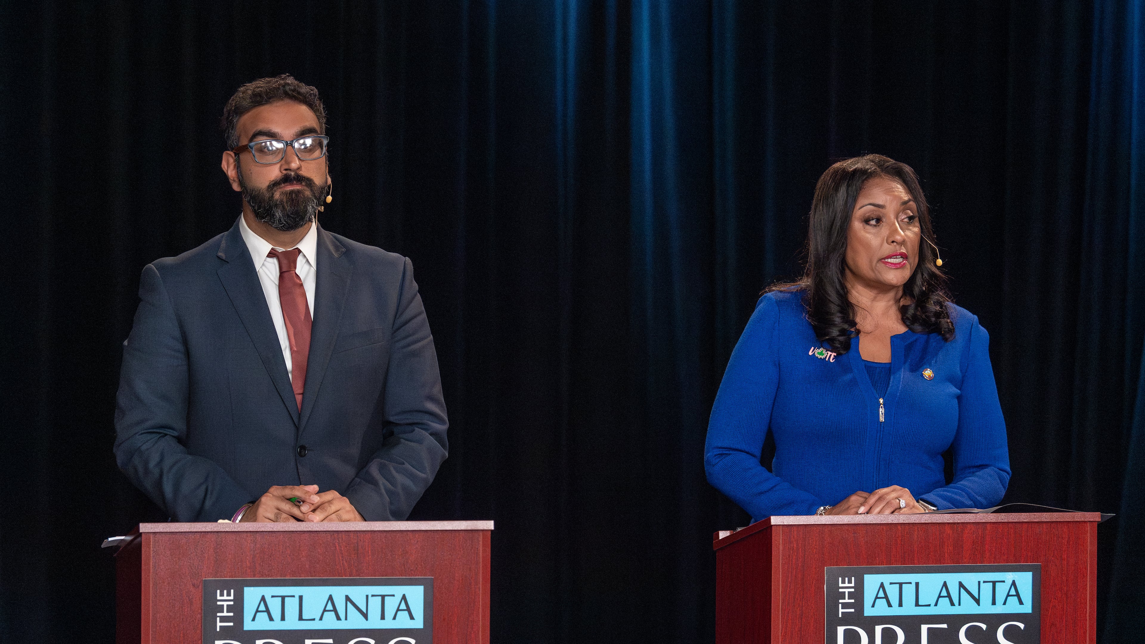 Rohit Malhotra (left) and Council member Marci Collier Overstreet, candidates for Atlanta City Council president, face off during the Atlanta Press Club debate Oct. 10, 2025. (Courtesy of John Glenn)