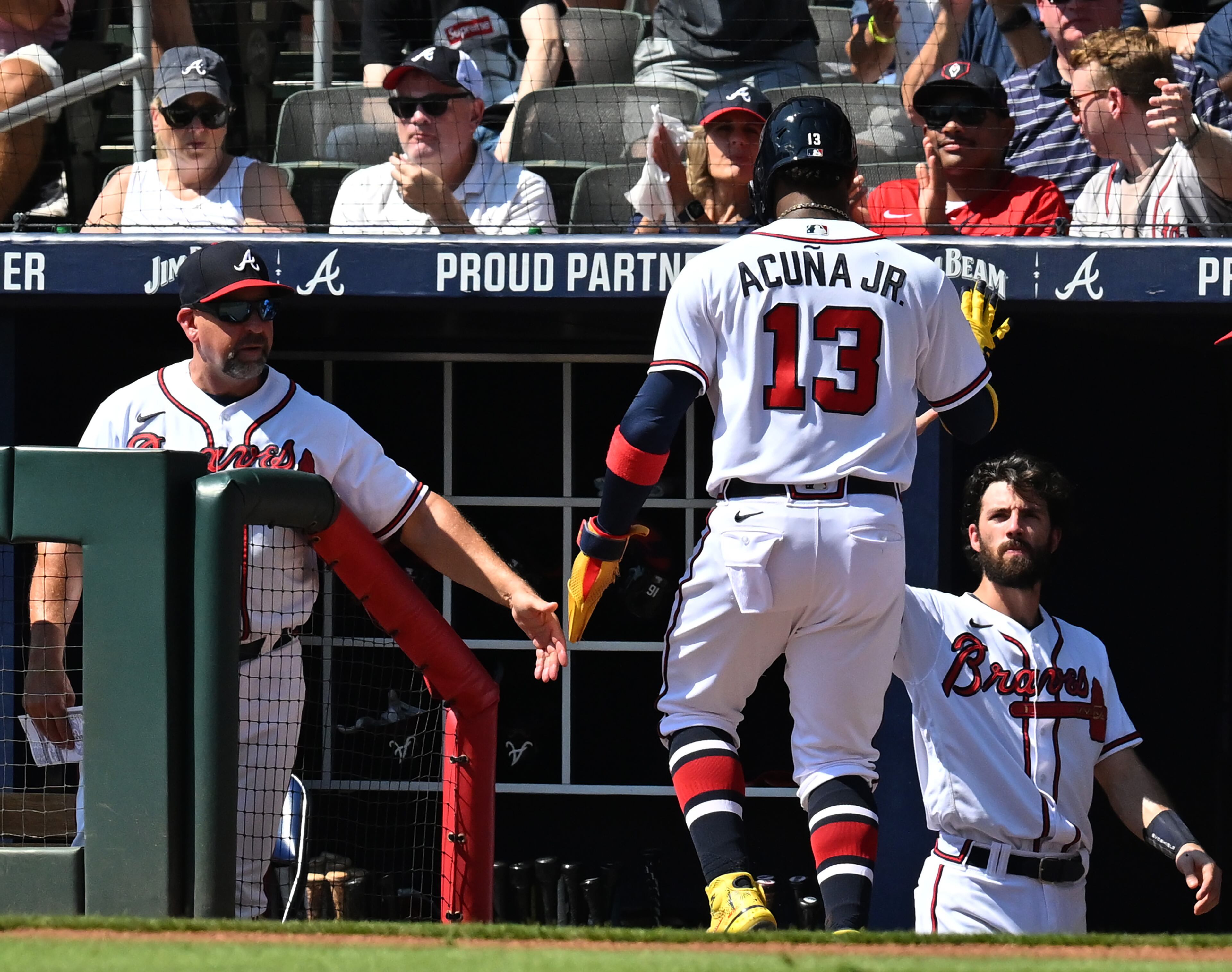Braves' right fielder Ronald Acuna Jr. (13) celebrates after scoring on an RBI single by Robbie Grossman in the first inning. (Hyosub Shin / Hyosub.Shin@ajc.com)