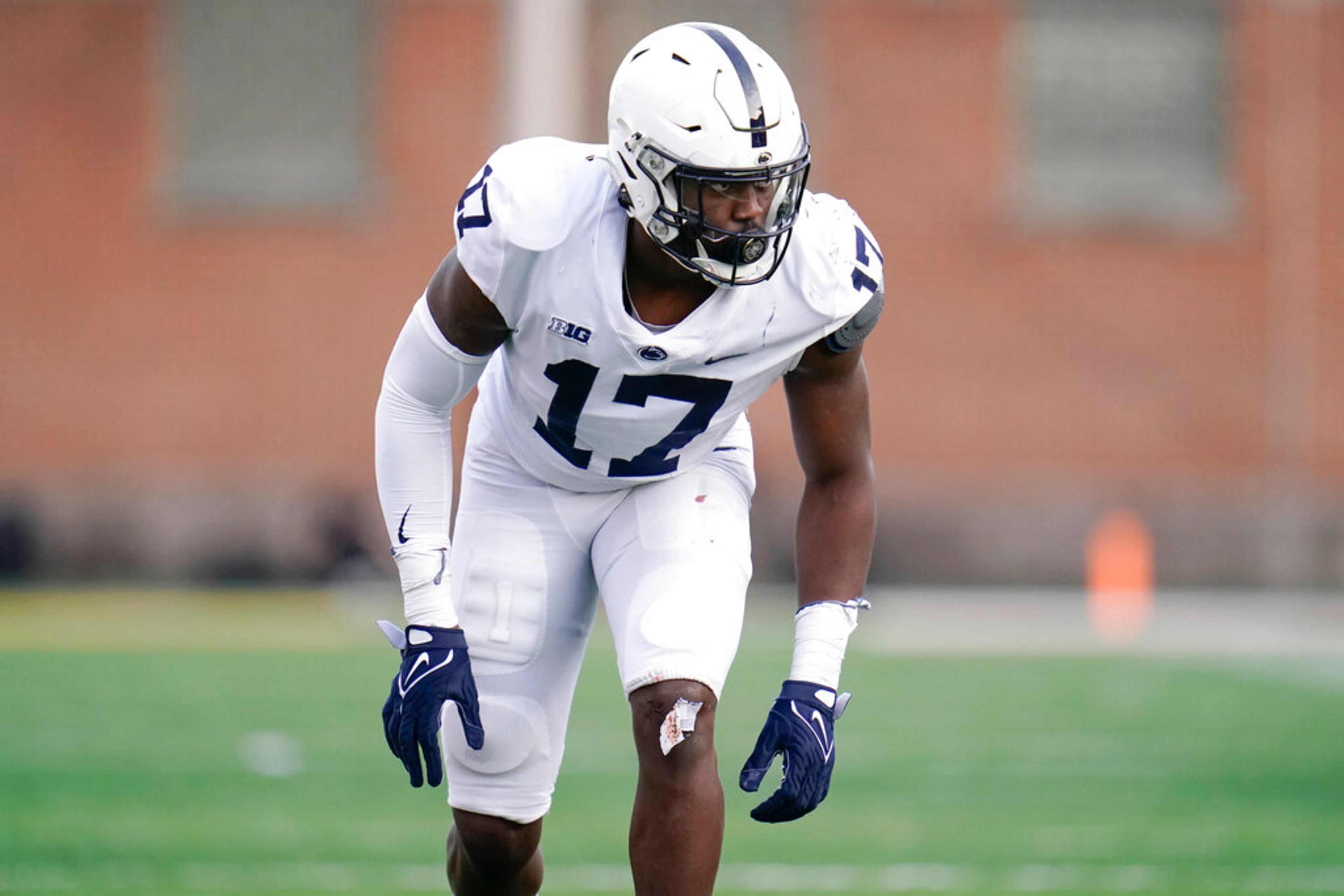 Penn State defensive end Arnold Ebiketie lines up against Maryland during the first half of an NCAA college football game, Saturday, Nov. 6, 2021, in College Park, Md. (AP Photo/Julio Cortez)