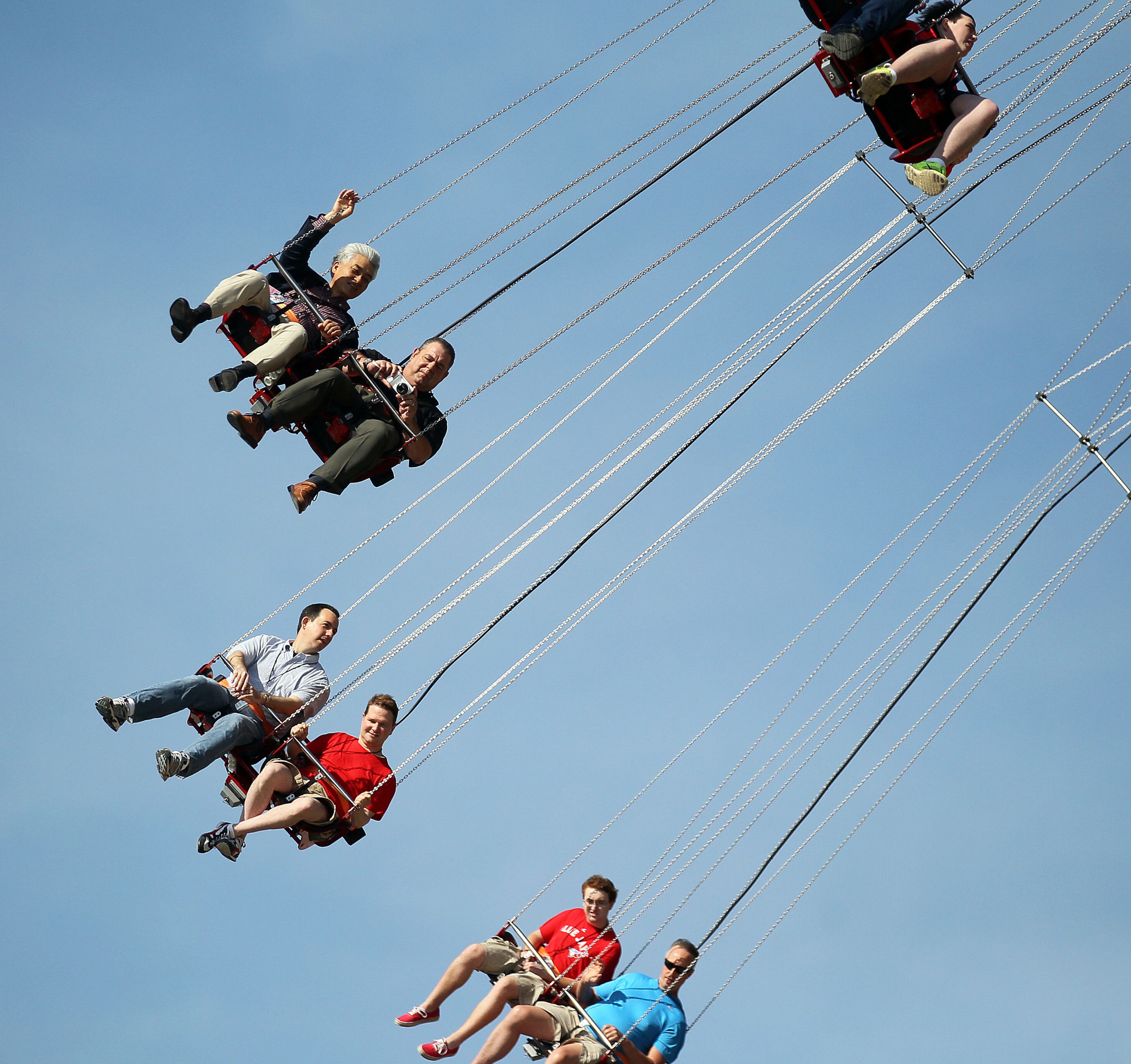 VIPs ride the new 24 story tall SkyScreamer extreme swing ride at Six Flags Over Georgia in Austell during a preview event on Thursday May 9th, 2013. Up to thirty-two guests can spin in a 98-foot circle at speeds of 40 miles per hour atop the new ride. PHIL SKINNER / PSKINNER@AJC.COM