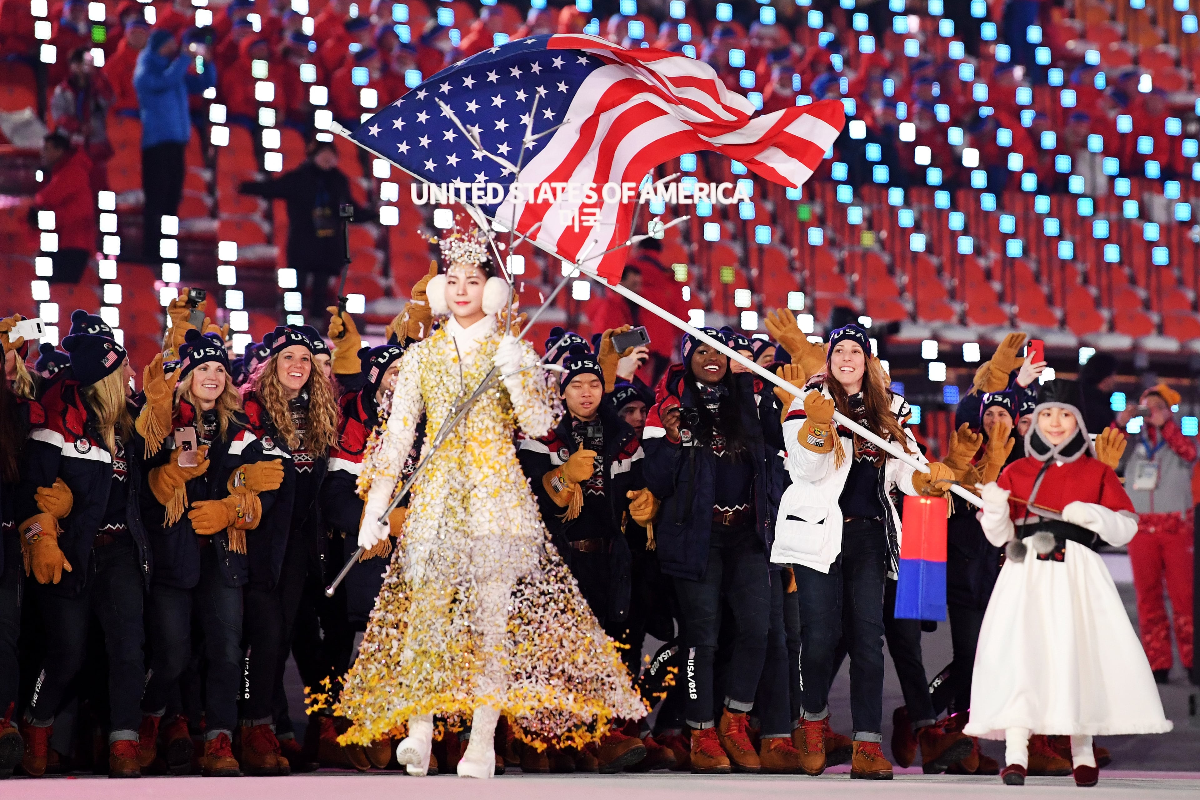 PYEONGCHANG-GUN, SOUTH KOREA - FEBRUARY 09: Flag bearer Erin Hamlin of the United States and teammates enter the stadium during the Opening Ceremony of the PyeongChang 2018 Winter Olympic Games at PyeongChang Olympic Stadium on February 9, 2018 in Pyeongchang-gun, South Korea. (Photo by Matthias Hangst/Getty Images)