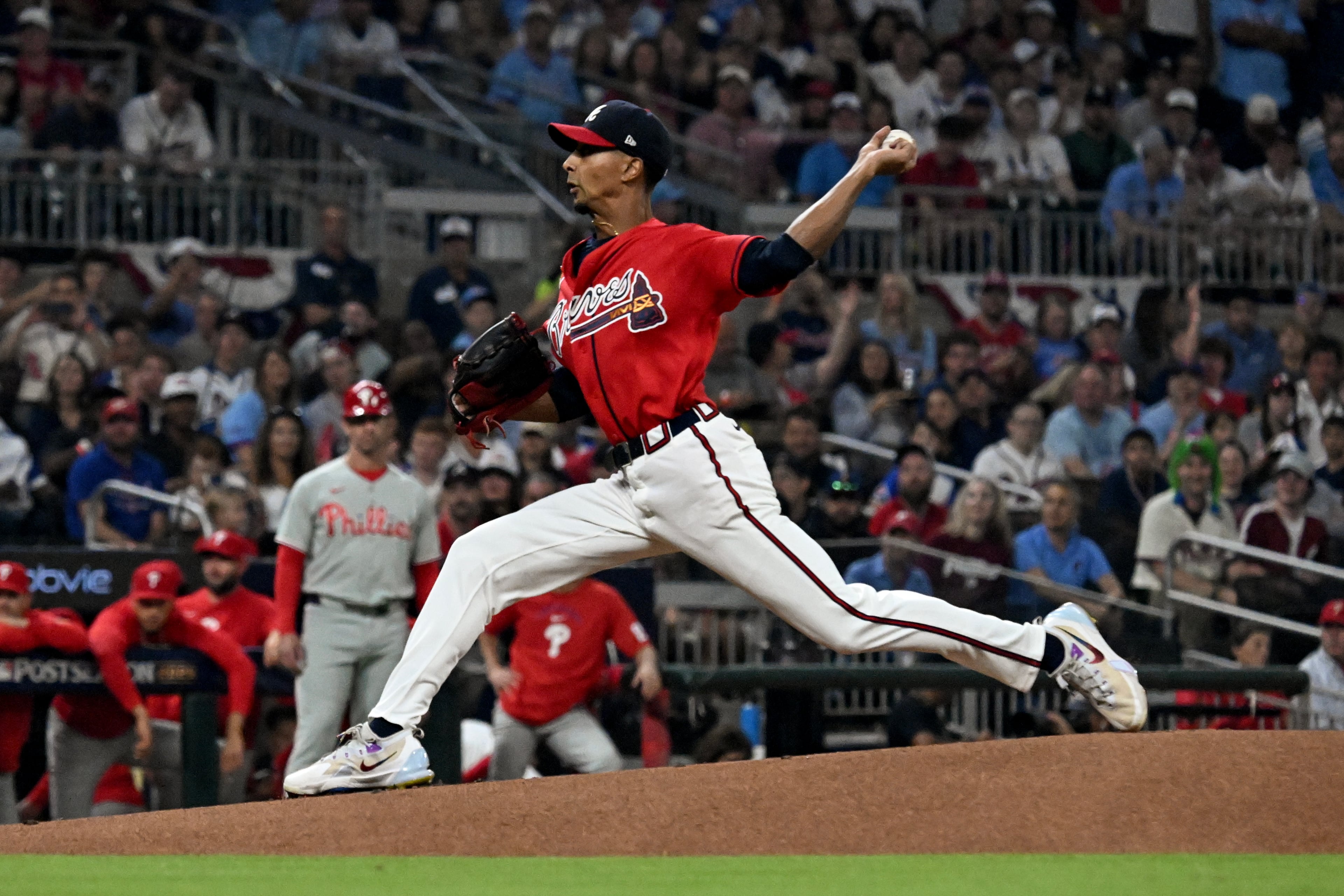Atlanta Braves pitcher Ray Kerr (62) delivers to a Philadelphia Phillies batter during the first inning of Game 3 of a MLB National League Wild Card playoff series between the Atlanta Braves and the Philadelphia Phillies, Thursday, Oct. 1, 2026, in Atlanta. (Hyosub Shin/AJC)