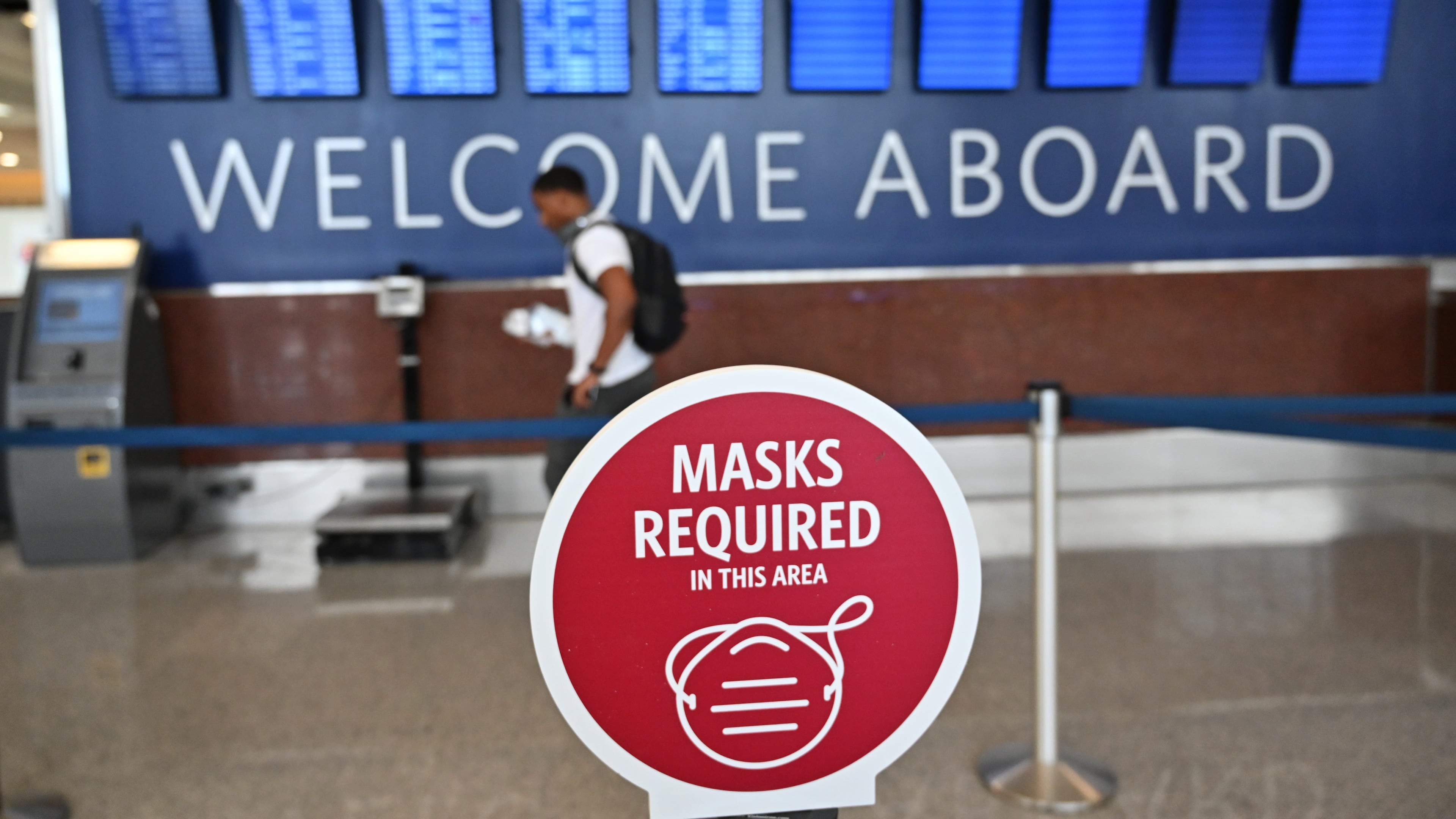 Travelers wearing face masks make their way to security checkpoints at Hartsfield-Jackson International Airport in Atlanta on Thursday, July 2, 2020. (Hyosub Shin / Hyosub.Shin@ajc.com)