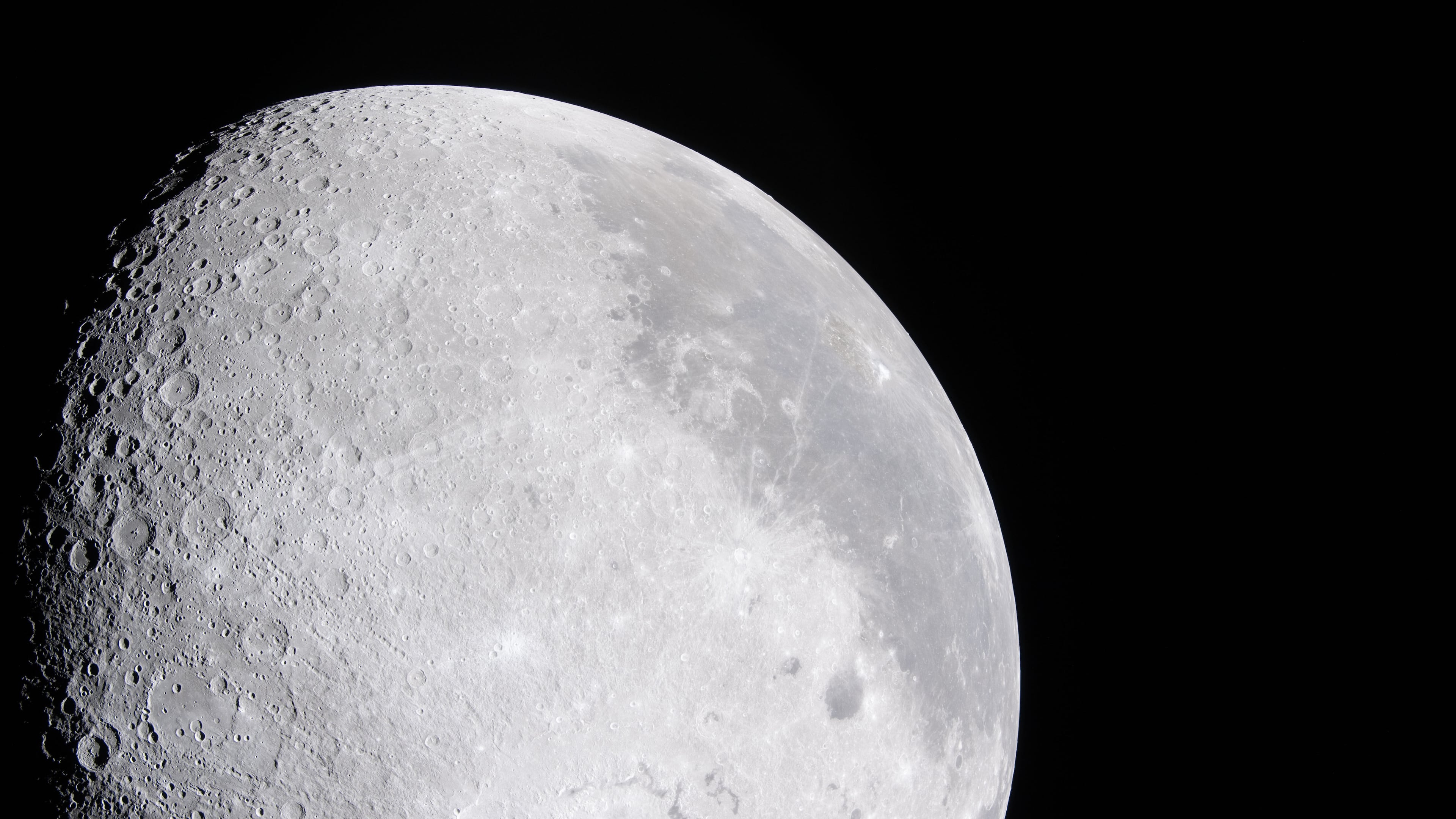In this image provided by NASA, the Artemis II crew photographed a bright portion of the Moon on April 6, 2026. (NASA via AP)