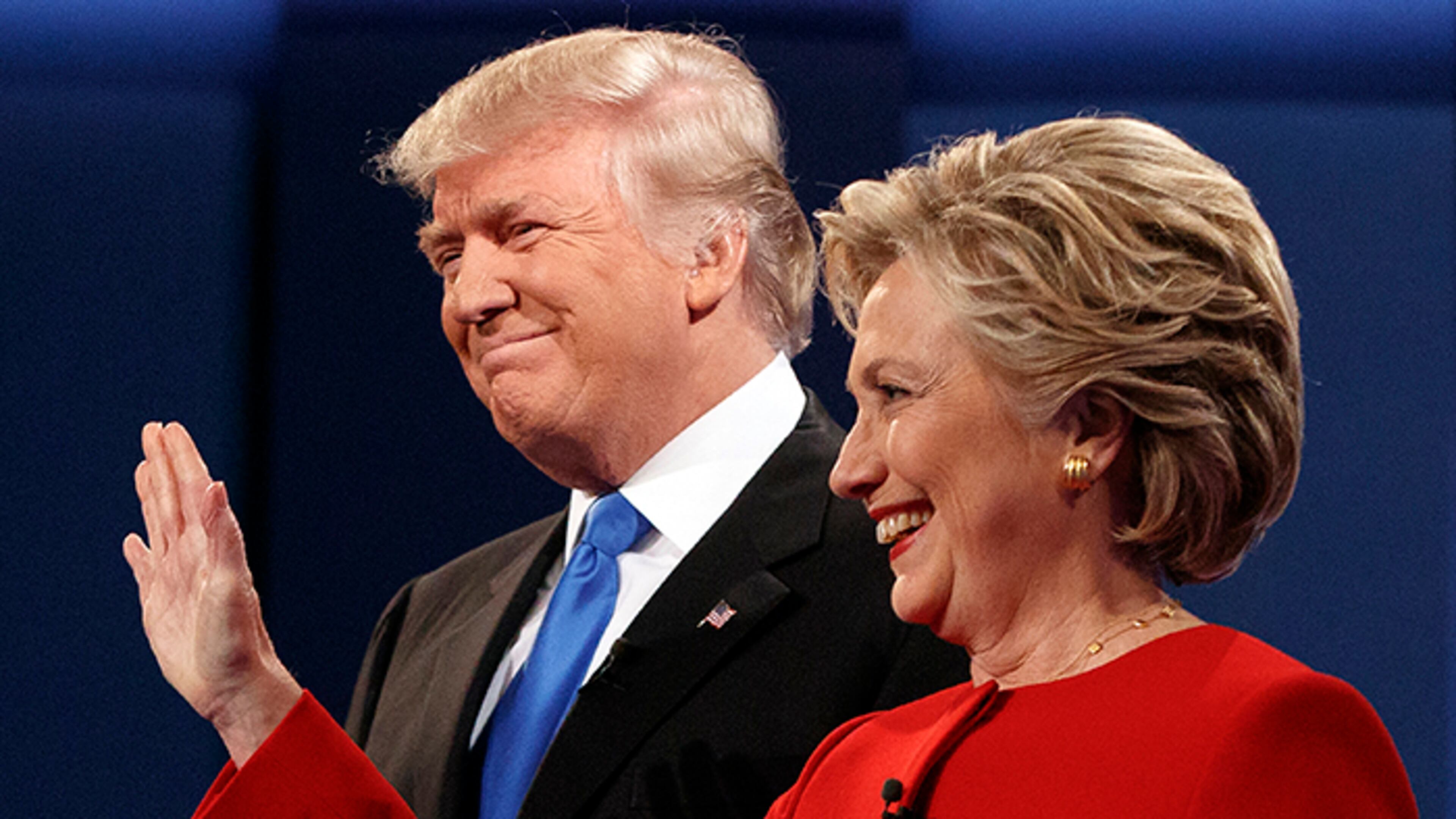 Republican presidential candidate Donald Trump, left, stands with Democratic presidential candidate Hillary Clinton at the first presidential debate at Hofstra University, Monday, Sept. 26, 2016, in Hempstead, N.Y. (AP Photo/ Evan Vucci)