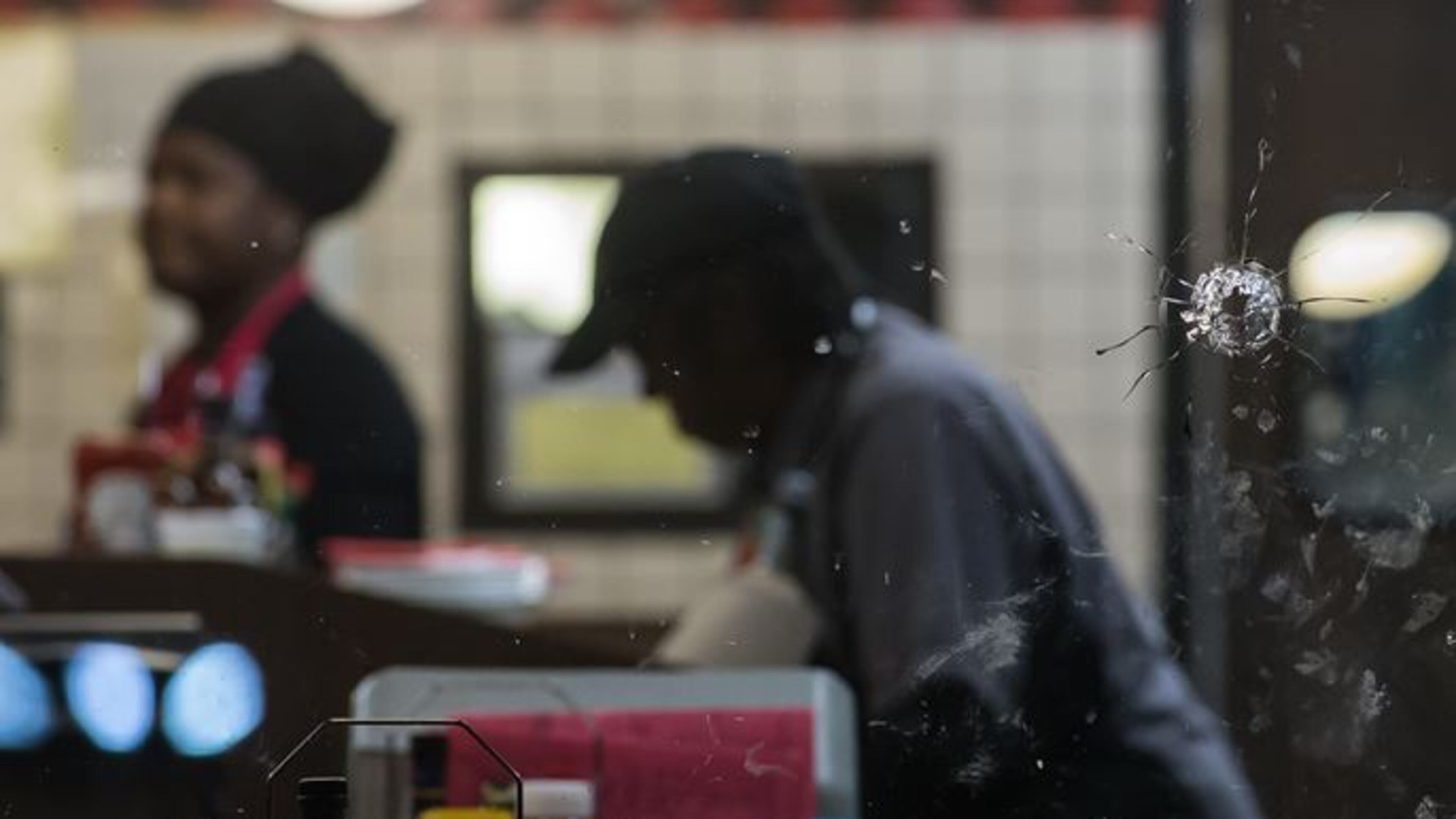 A bullet pierced an East Point Waffle House in a shooting that injured a cook early Tuesday, Channel 2 Action News reported. BRANDEN CAMP / SPECIAL