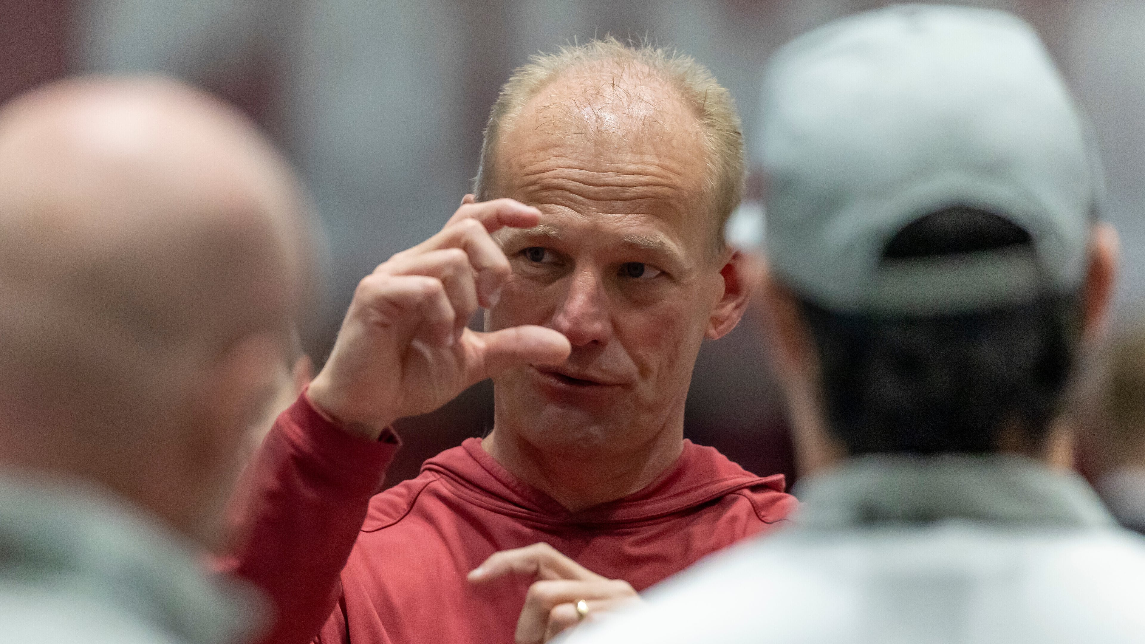 FILE - Alabama head coach Kalen DeBoer talks with visitors during Alabama's NFL football pro day, Wednesday, March 25, 2026, in Tuscaloosa, Ala. (AP Photo/Vasha Hunt, File)