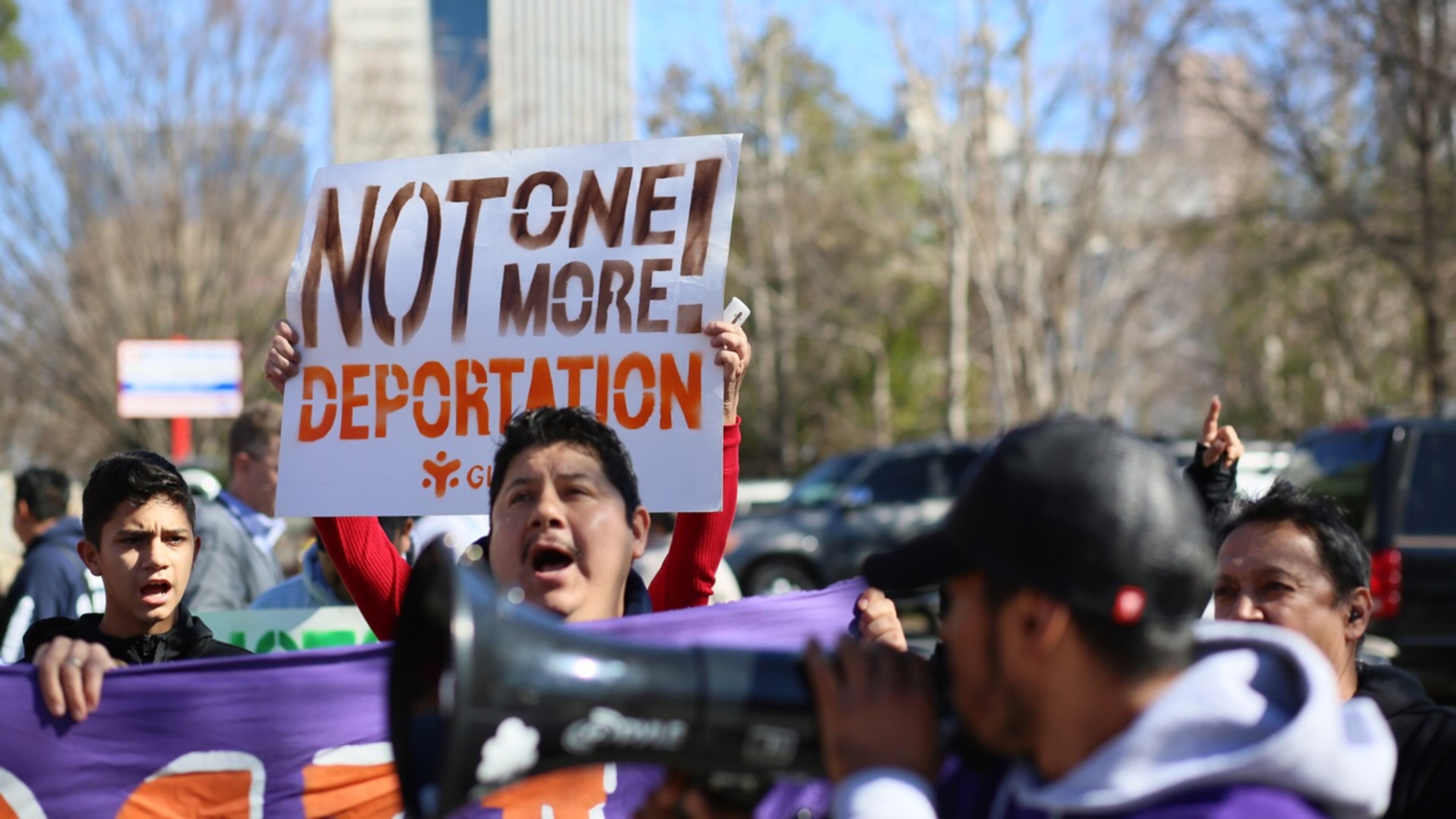 Dozens of people gathered outside federal offices in Atlanta in February, part of a strike called ‘a day without immigrants.”Miguel Martínez/MundoHispanico