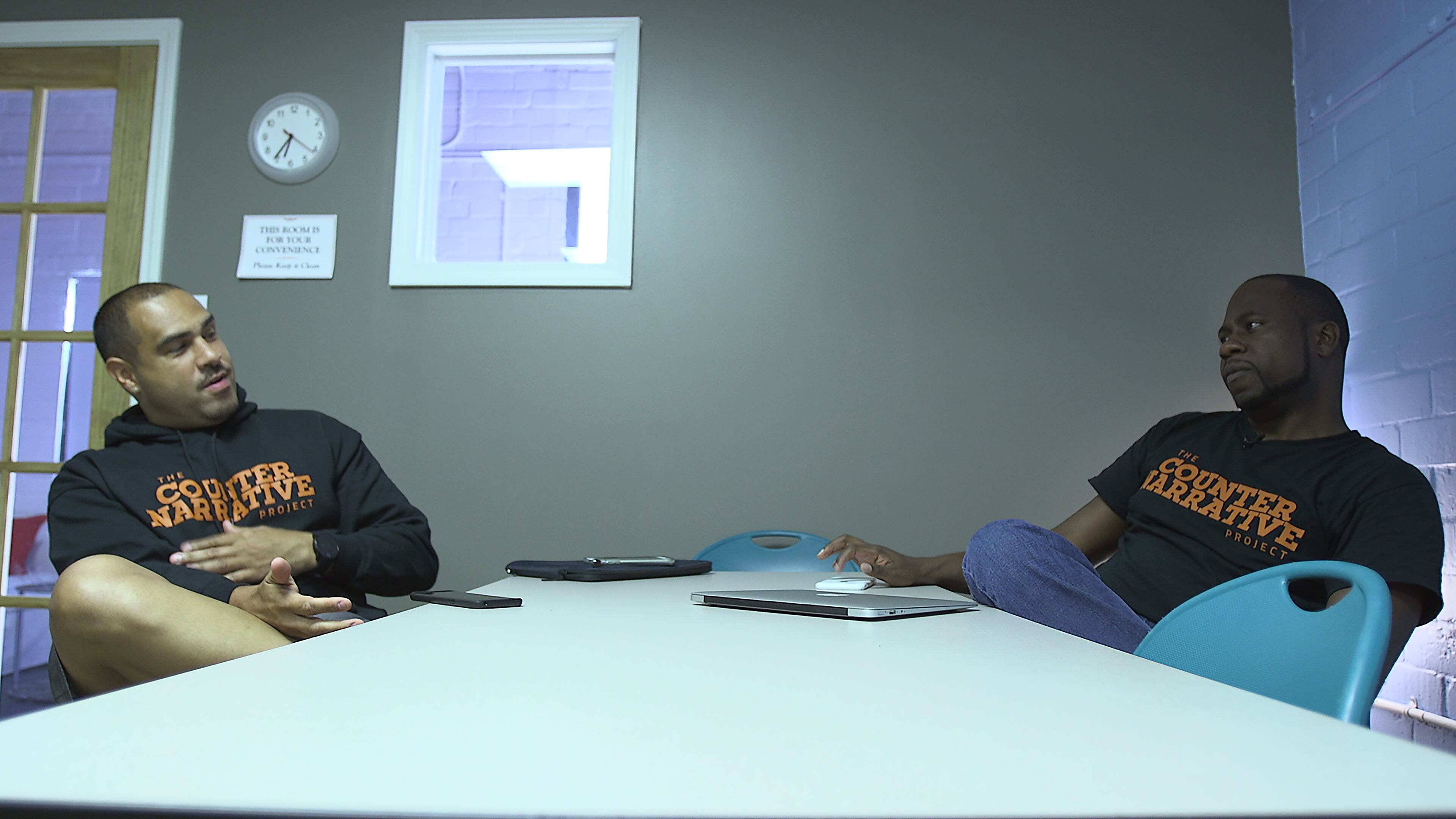 Dr. David Malebranche (left) and Charles Stephens talk at the Phillip Rush Center. RYON HORNE/RHORNE@AJC.COM