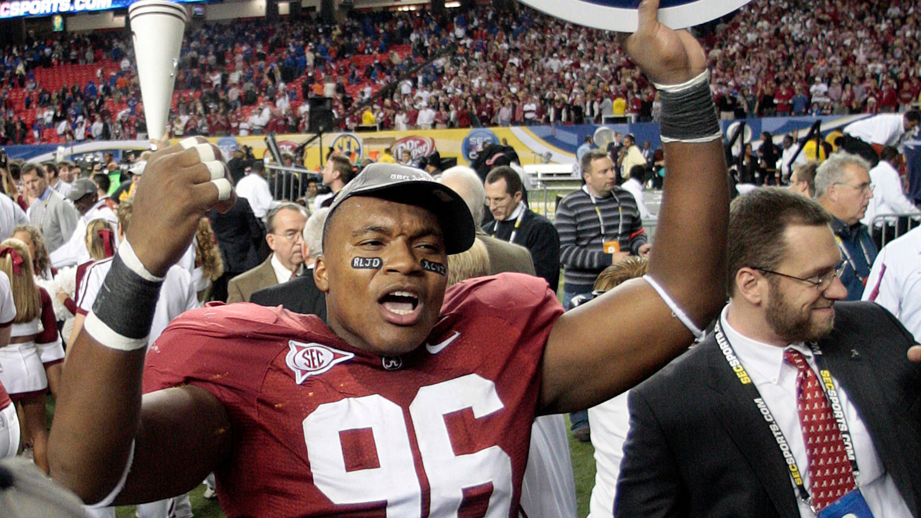 FILE - Alabama's Luther Davis (96) reacts after their 32-13 win over Florida in the SEC championship NCAA college football game at the Georgia Dome in Atlanta Saturday, Dec. 5, 2009. (AP Photo/Dave Martin, File)