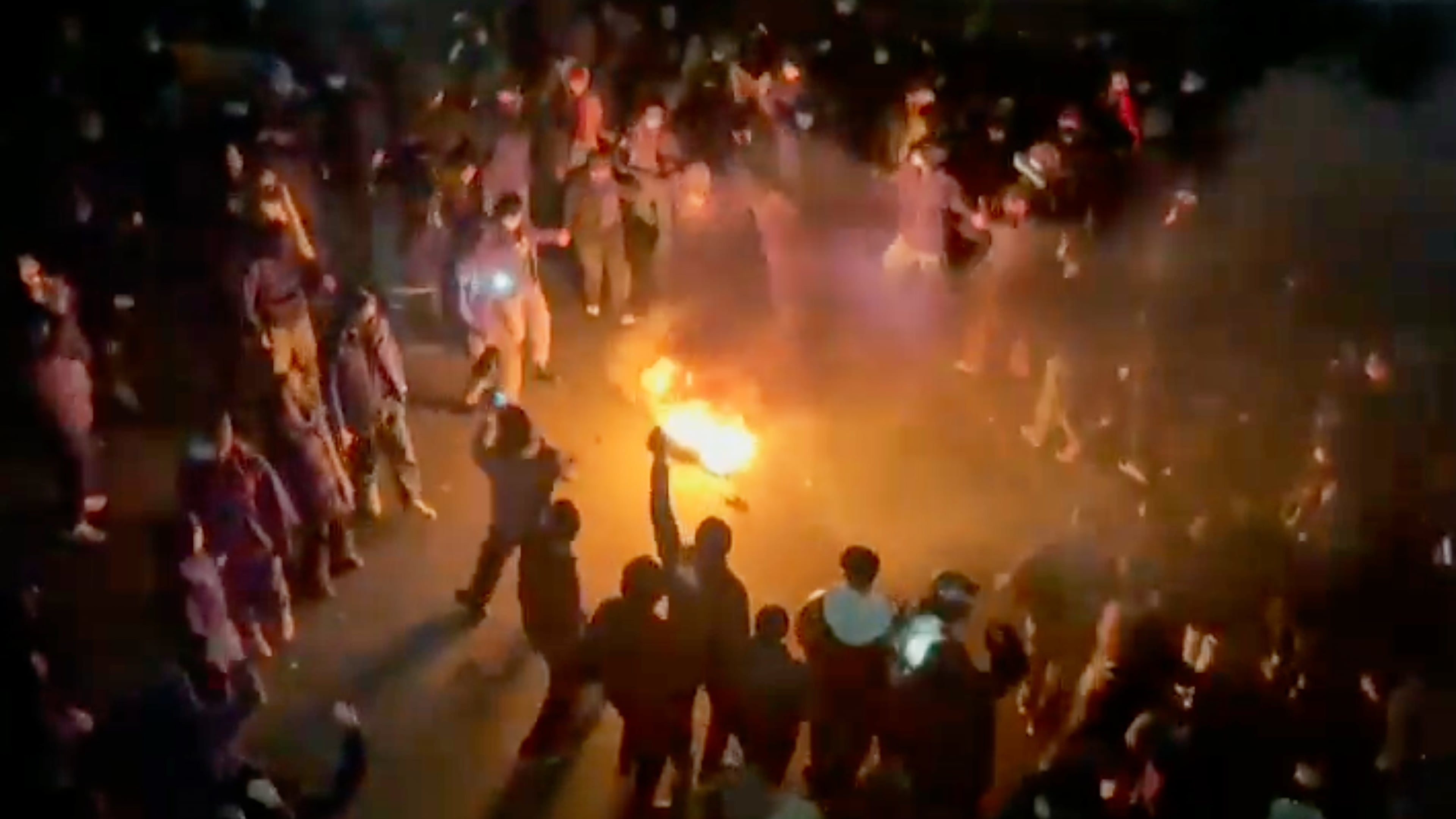 FILE - In this frame grab from footage circulating on social media shows protesters dancing and cheering around a bonfire as they take to the streets despite an intensifying crackdown as the Islamic Republic remains cut off from the rest of the world, in Tehran, Iran, Jan. 9, 2026.(UGC via AP, File)