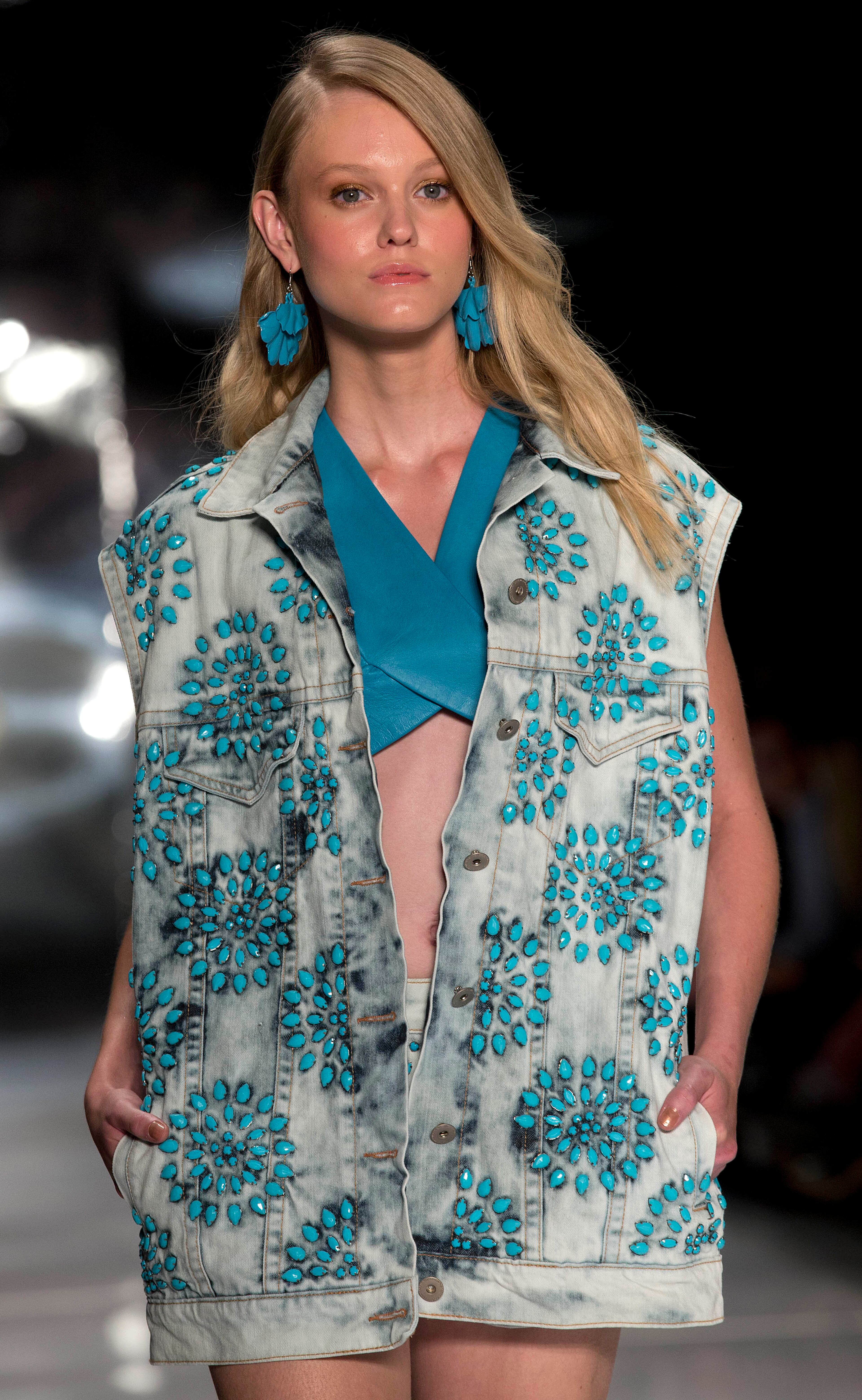 A model wears a creation from the Colcci Summer collection during Sao Paulo Fashion Week in Sao Paulo, Brazil, Wednesday, April 2, 2014.