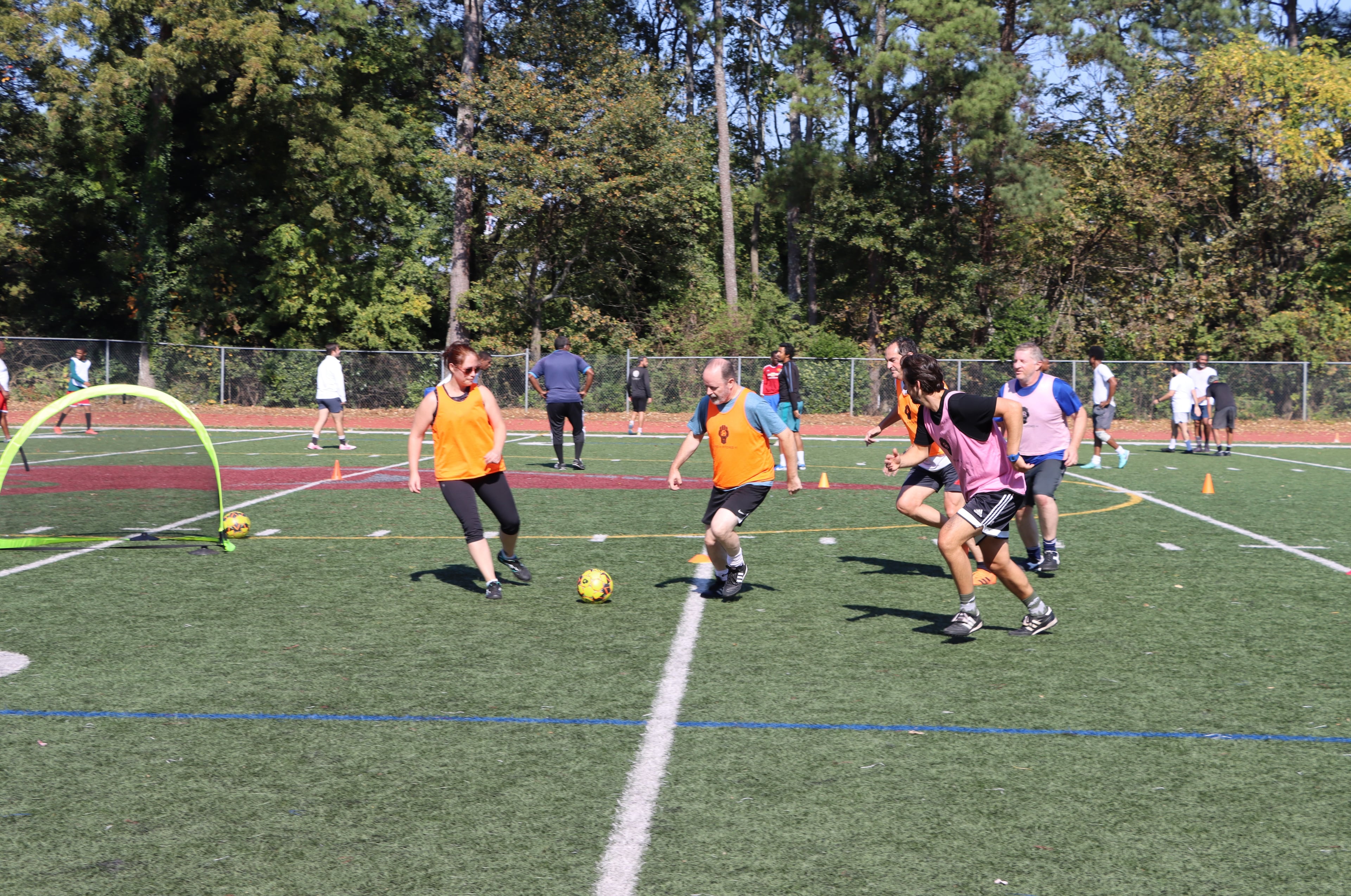 Buford resident David Massie (center) plays soccer with other participants of an Emory University study into the cardiovascular benefits of adults playing recreational soccer. (Rob Spahr/Courtesy of Emory University)