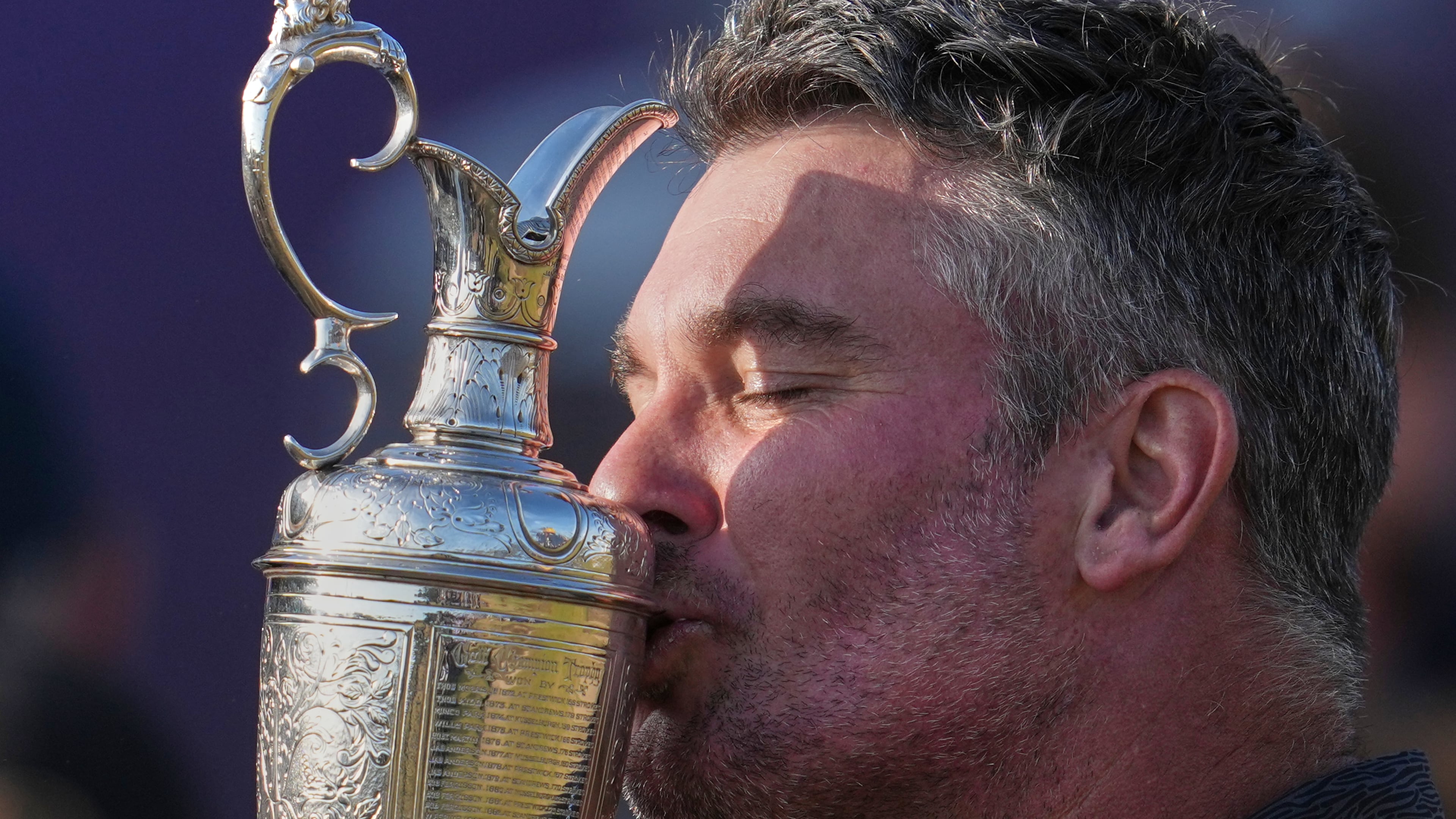 Ryan Fox of New Zealand kisses the Claret Jug trophy after winning the British Open Golf championships at Royal Birkdale golf club, in Southport, England, Sunday, July 19, 2026. (AP Photo/Jon Super)
