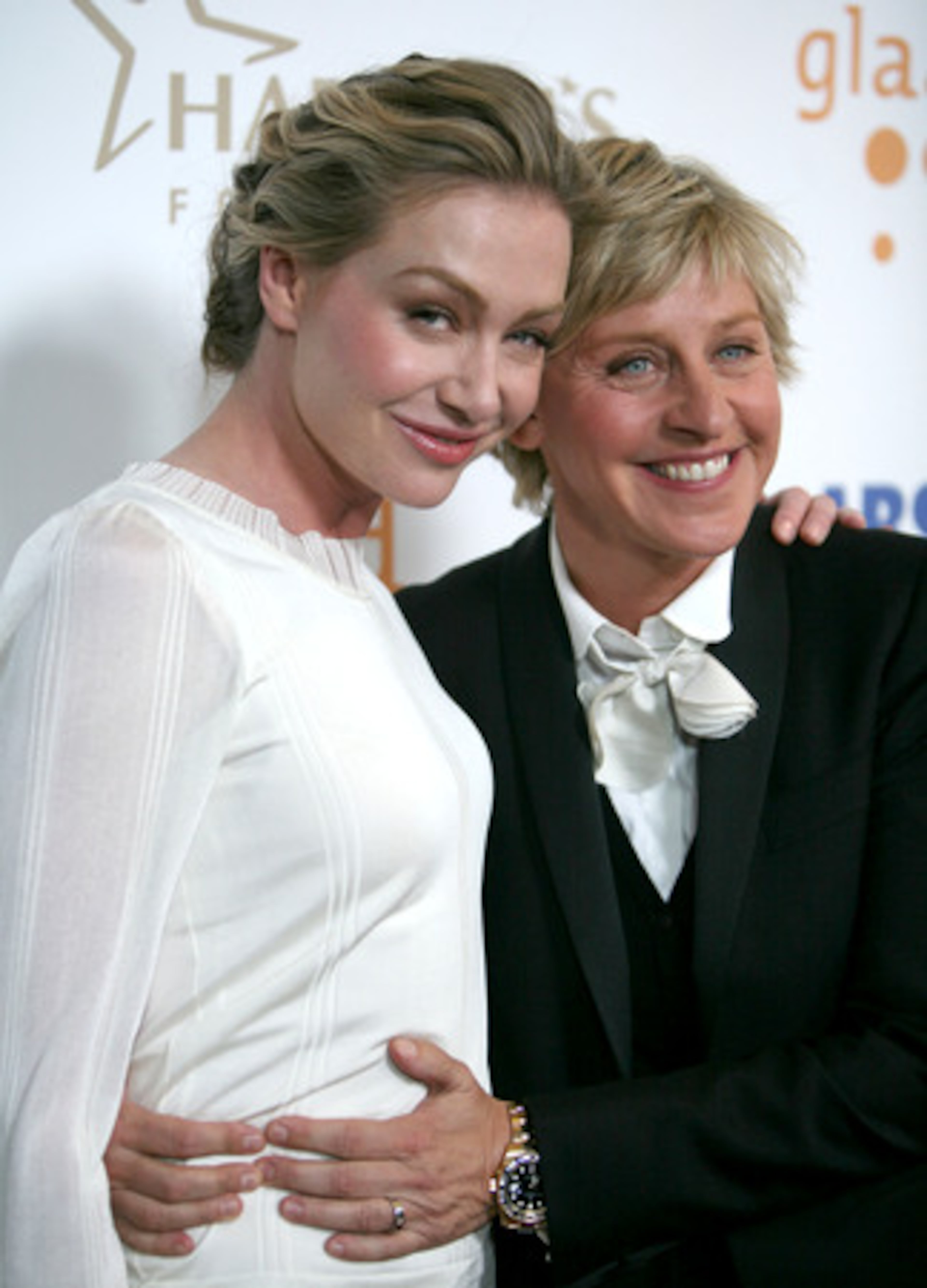 CUTE BLOND COUPLE Portia de Rossi and her partner, Ellen DeGeneres, arrive at the awards show.