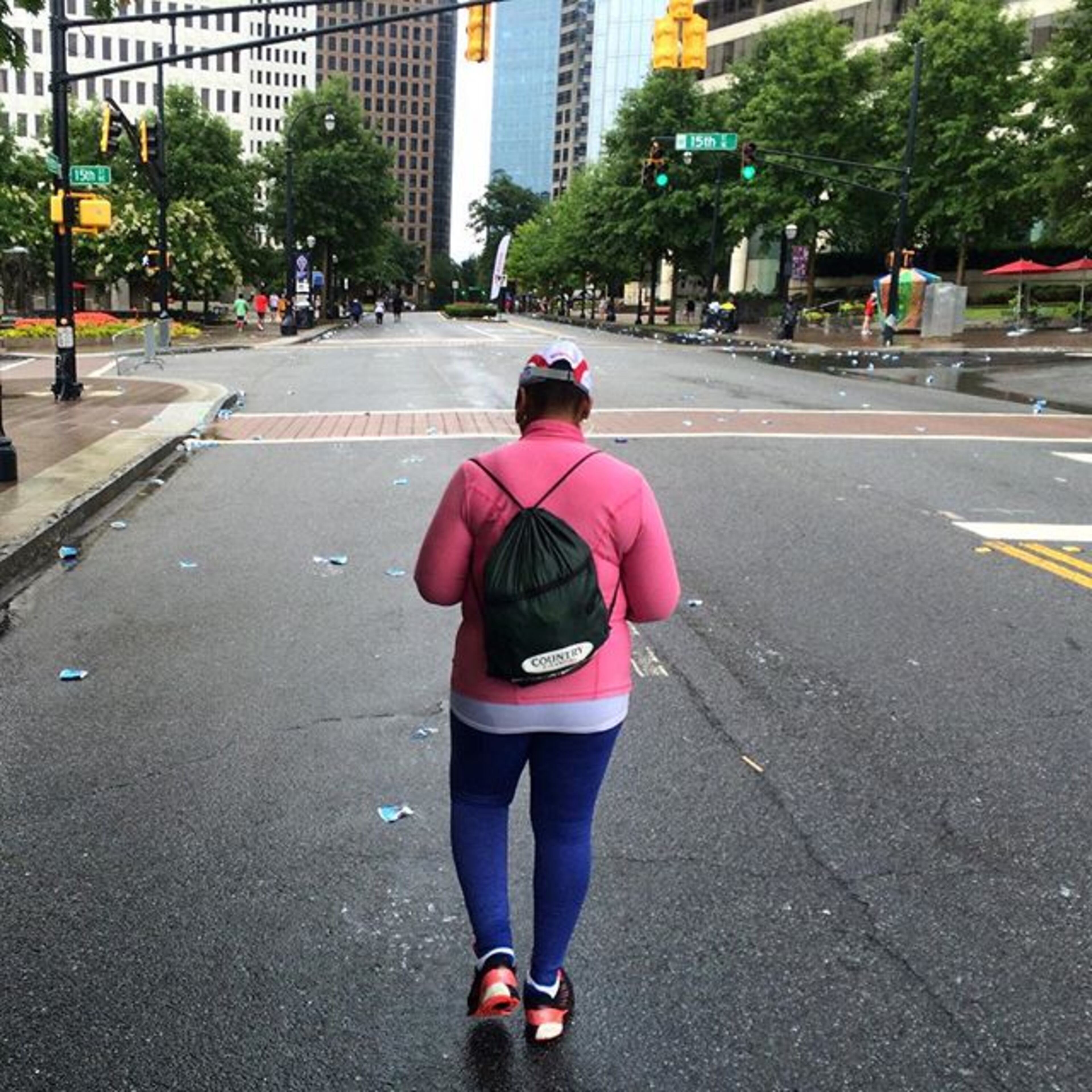 @photobgray: #runography My new hero! Amanda Rouser continues down Peachtree Street after police came through to clear people off the AJC Peachtree Road Race course. Despite having an injured leg, this first time participant said she was going to finish. See full coverage on AJC.com and in the Sunday AJC. #ajcprr