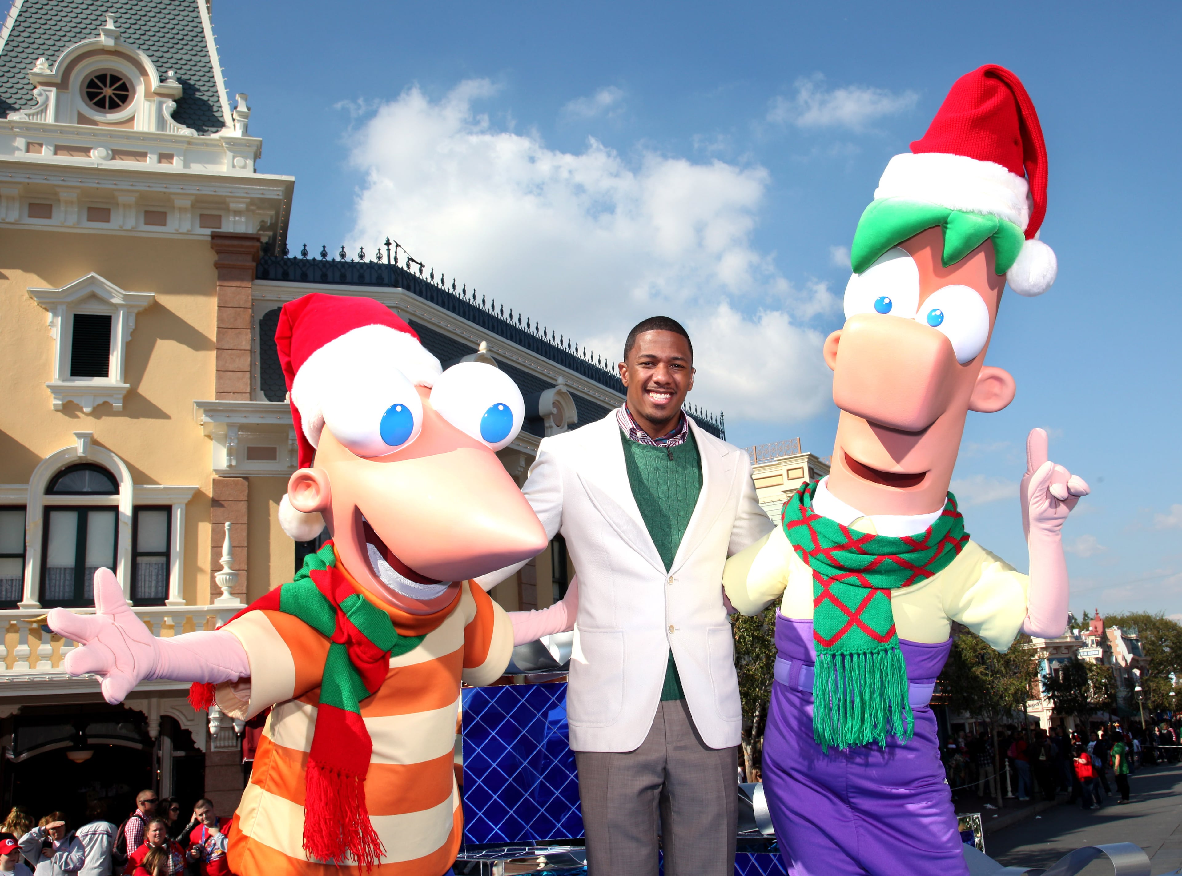 ANAHEIM, CA - NOVEMBER 05: In this handout image provided by Disney Parks, Nick Cannon (C) is joined by Disney Channel characters Phineas (L) and Ferb (R) during the taping of the 2011 Disney Parks Christmas Day Parade on november 5, 2011 at Disneyland in Anaheim, California. The show airs Christmas Day (December 25, 2011), at various times across the country, on ABC. (Photo by Paul Hiffmeyer/Disney Parks via Getty Images)