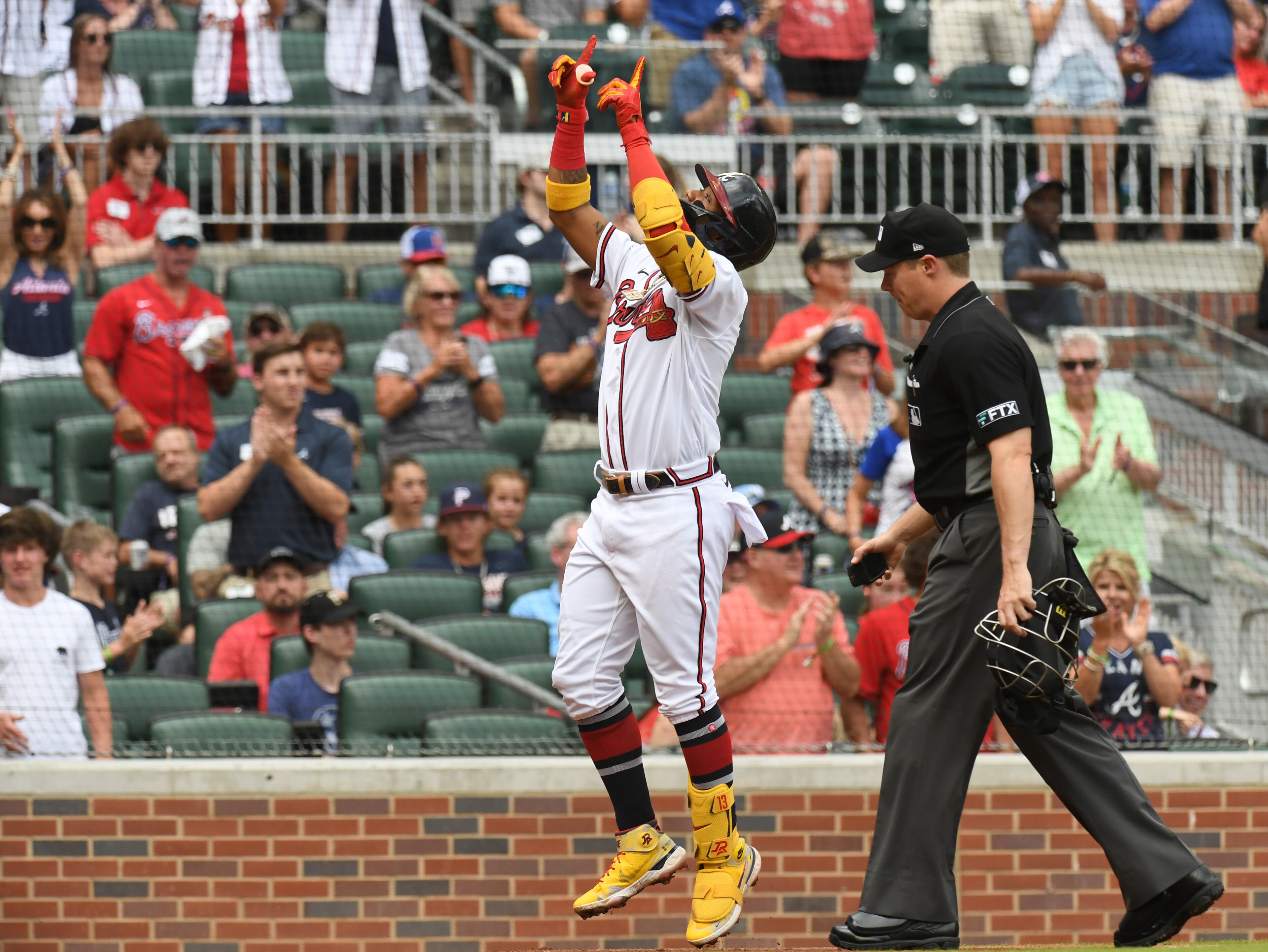 June 11, 2022 Atlanta - Atlanta Braves' right fielder Ronald Acuna (13) celebrates after hitting a solo home run against Pittsburgh Pirates in the first inning at Truist Park on Saturday, June 11, 2022. (Hyosub Shin / Hyosub.Shin@ajc.com)