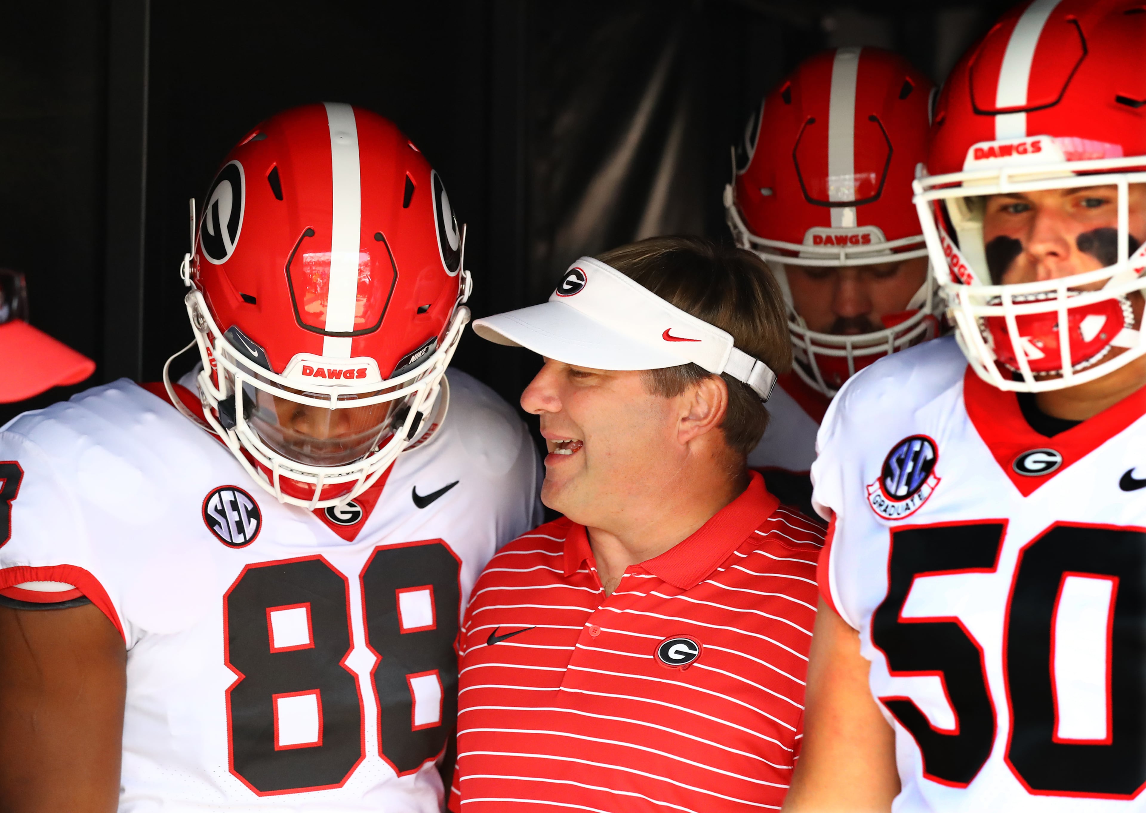 Georgia football coach Kirby Smart said street racing and reckless driving charges against Jalen Carter, left, are "deeply concerning." Carter is charged in connection to a fatal crash that killed offensive lineman Devin Willock and recruiting analyst Chandler LeCroy. (Curtis Compton / Curtis Compton@ajc.com)