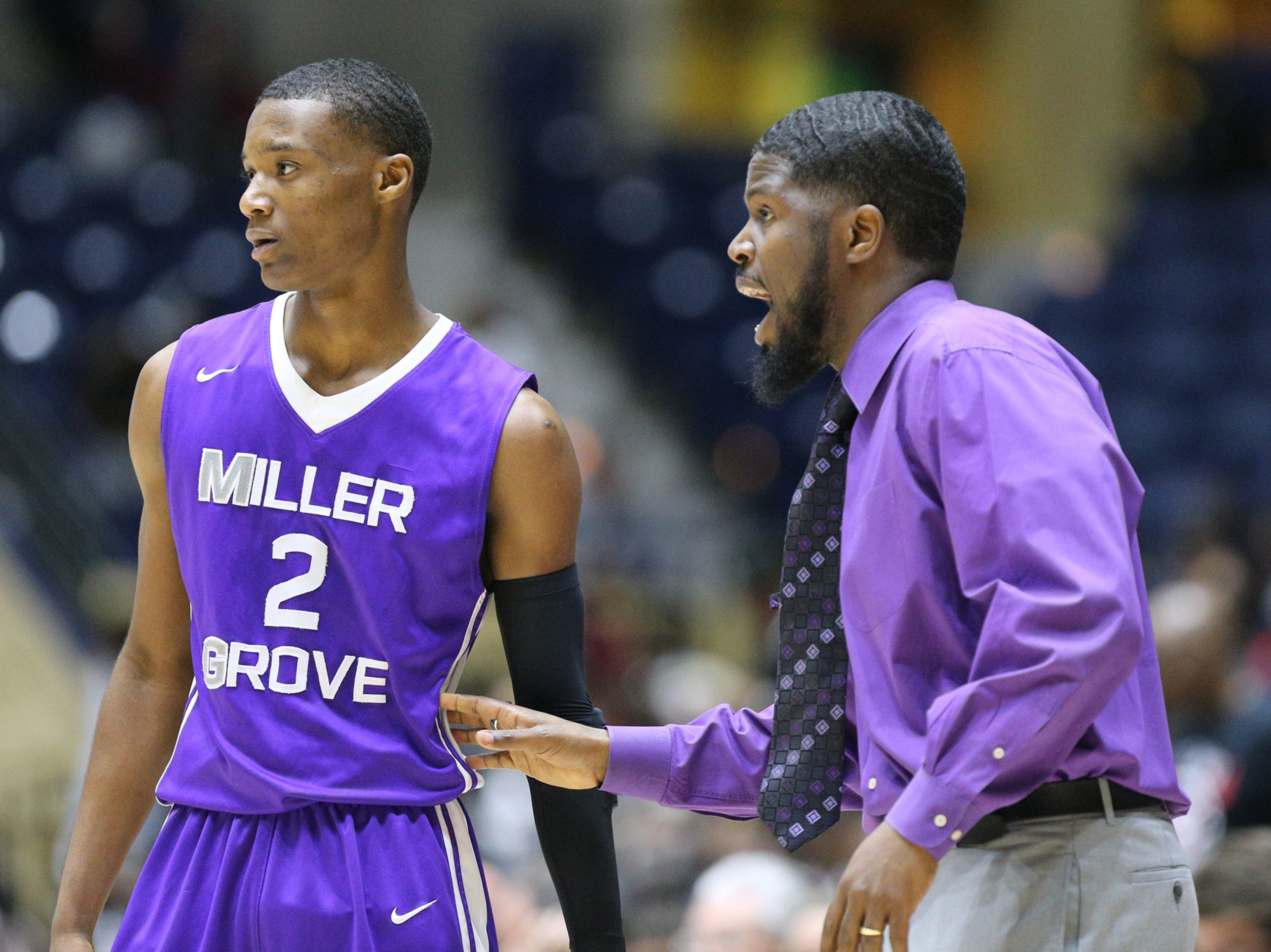 March 8, 2018 Macon: Miller Grove head coach Rasul Chester coaches up guard Timothy Stargell Jr. in the final minutes against Warner Robins in their GHSA state basketball championship game on Thursday, March 8, 2018, in Macon. Curtis Compton/ccompton@ajc.com