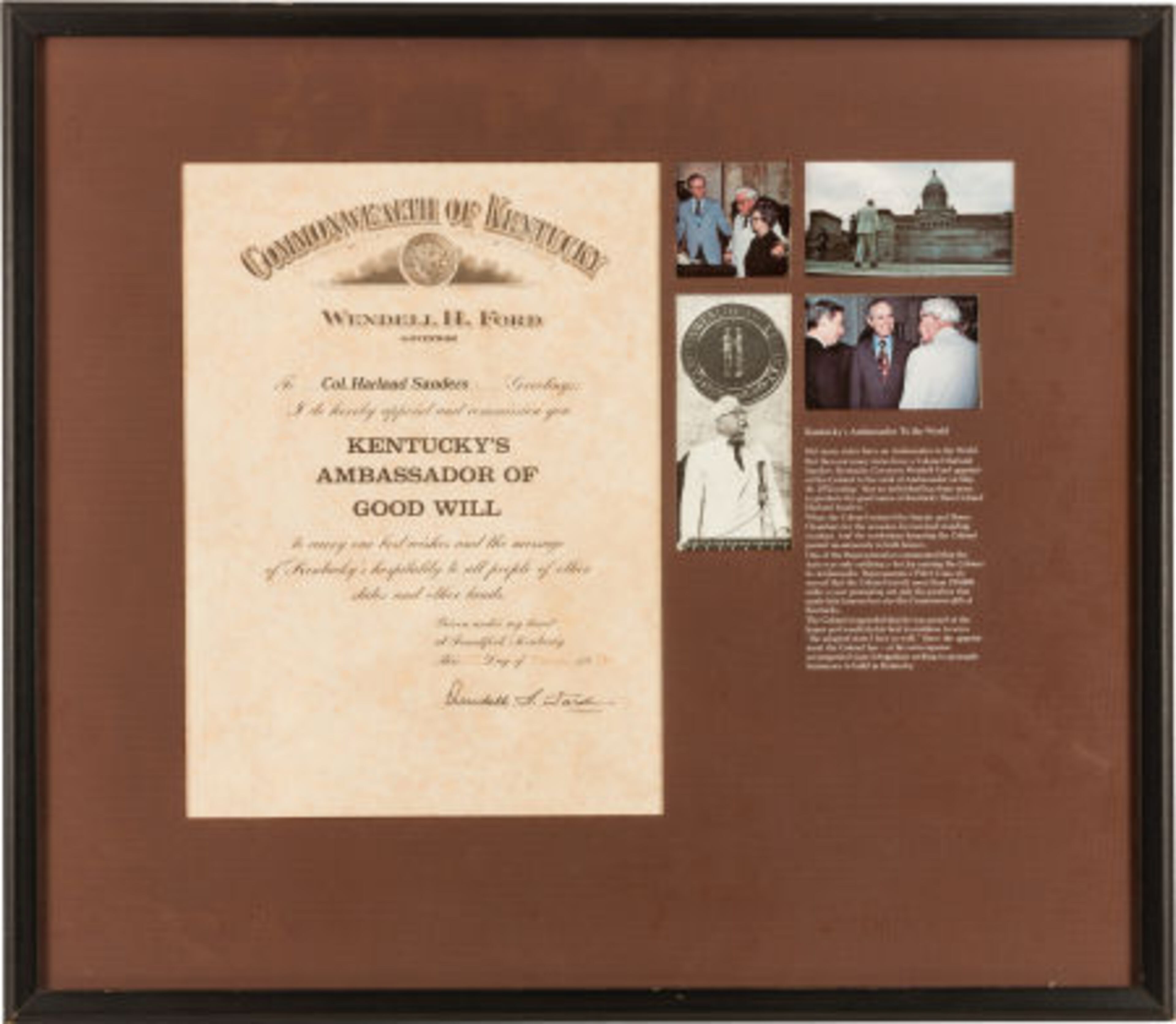 "Ambassador of good will" plaque presented to Colonel Sanders by Governor Wendell Ford