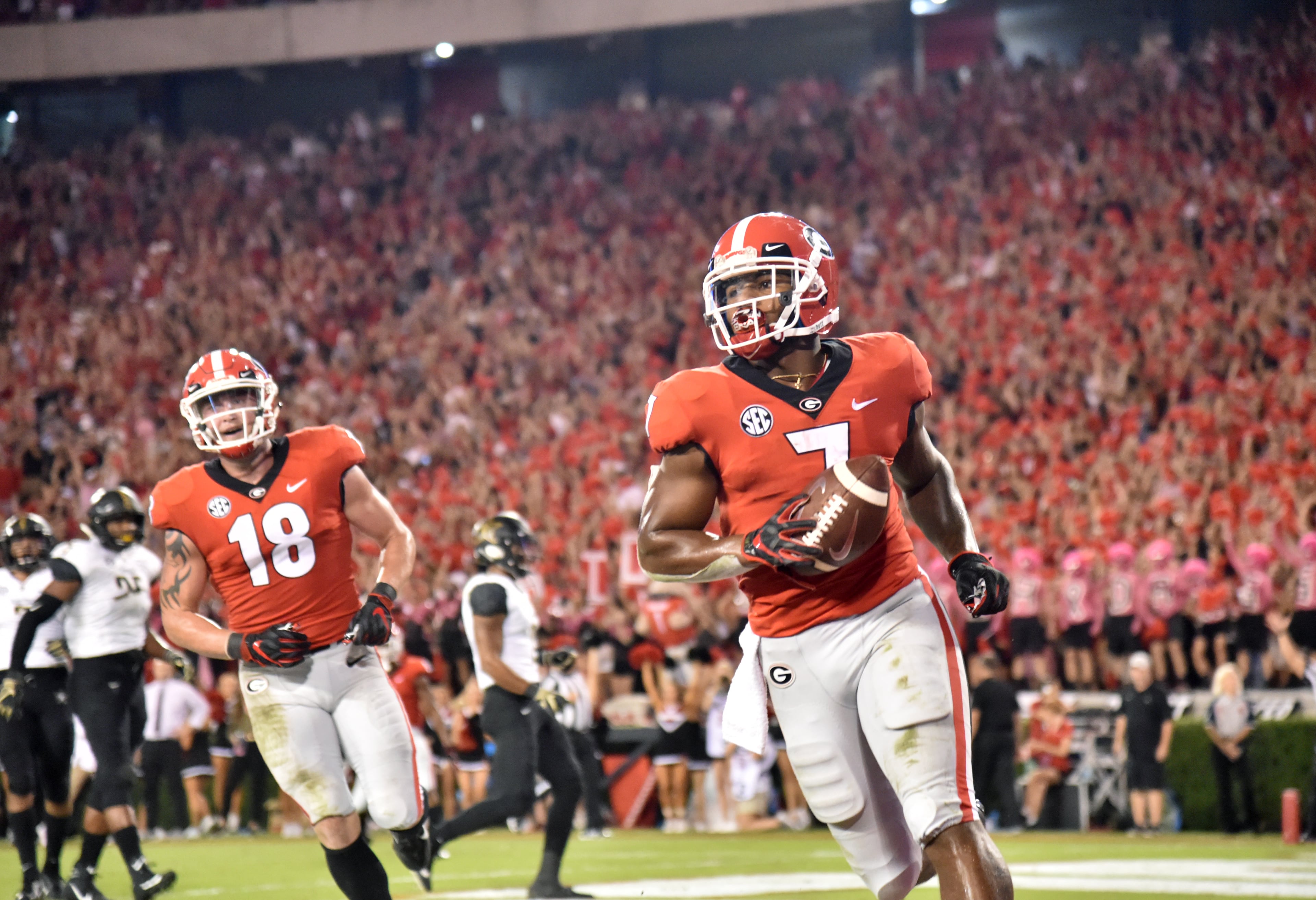 October 6, 2018 Athens - Georgia running back D'Andre Swift (7) scores a touchdown in the second half during a NCAA college football game at Sanford Stadium in Athens on Saturday, October 6, 2018. Georgia won 41-13 over the Vanderbilt. HYOSUB SHIN / HSHIN@AJC.COM