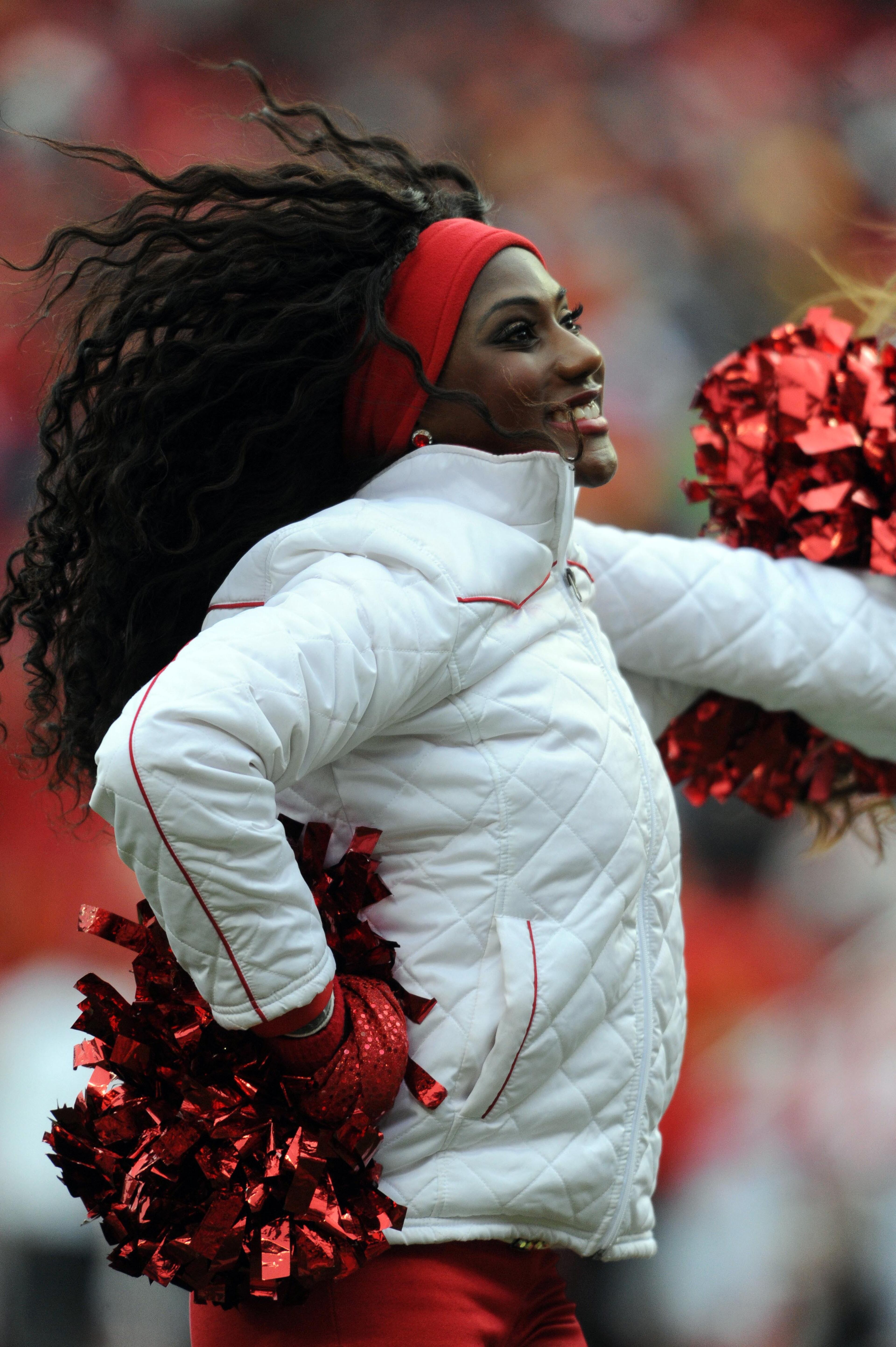 A Kansas City Chiefs cheerleader entertains the crowd during the second half of the game against the San Diego Chargers at Arrowhead Stadium. The Chargers won 41-38. Mandatory Credit: Denny Medley-USA TODAY Sports