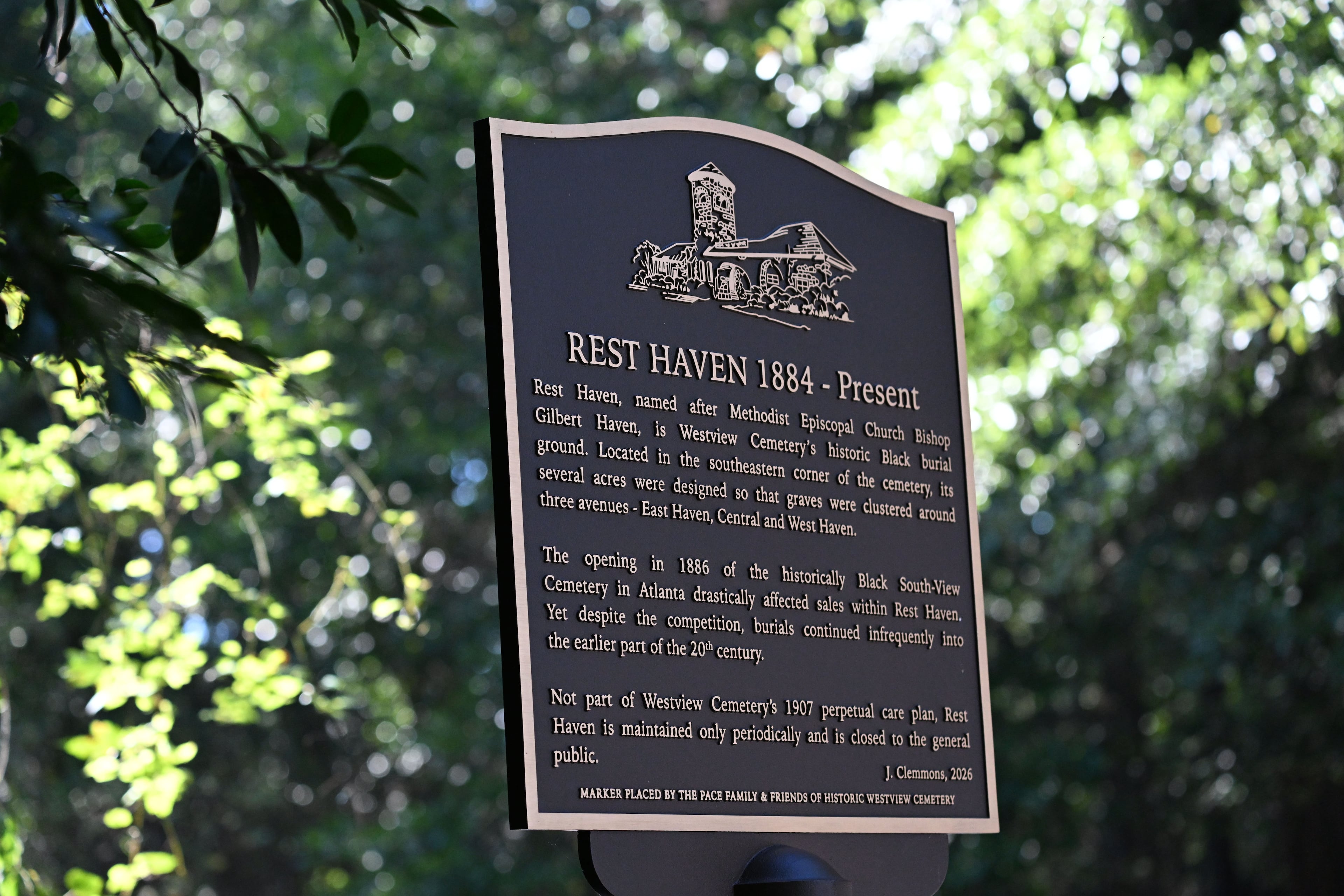 A new historical marker tells the story of Rest Haven. The Black burial ground opened in 1884, but sales of plots slowed two years later when South-View Cemetery was established to serve the Black community. Nonetheless, Rest Haven burials continued into the early 20th century. (Hyosub Shin/AJC)