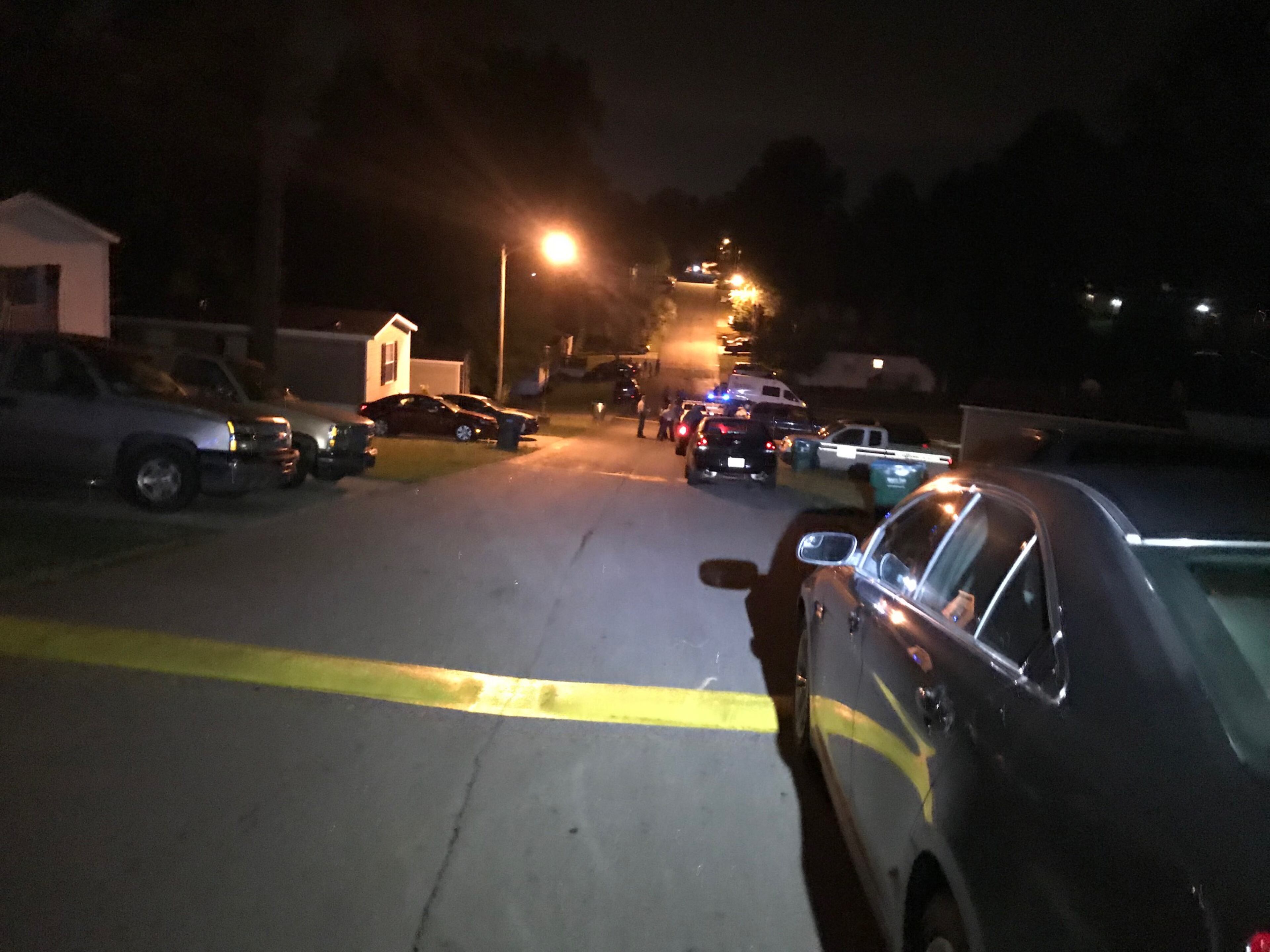 Gwinnett County police investigate a Wednesday night fatal shooting at Smokecreek mobile home park in unincorporated Snellville. (Credit: Channel 2 Action News)