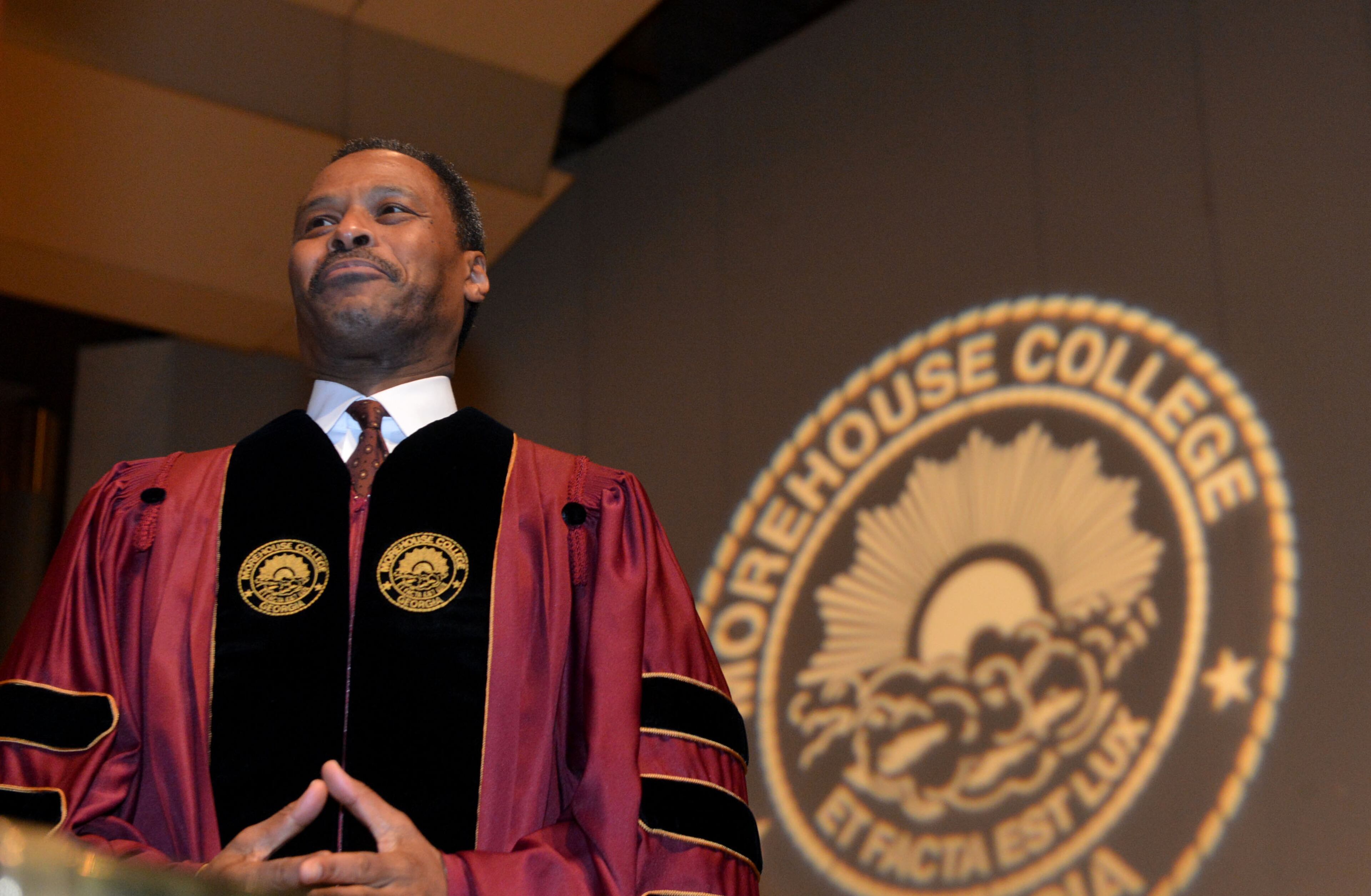 President John S. Wilson Jr. smiles as he is presented the symbols of his office during the program. Morehouse College hosted the inauguration of its 11th president John Silvanus Wilson Jr. at the Martin Luther King Jr. International Chapel, Friday, February 14, 2014. Wilson has been on the job since January 2013. Wilson is a 1979 Morehouse graduate.