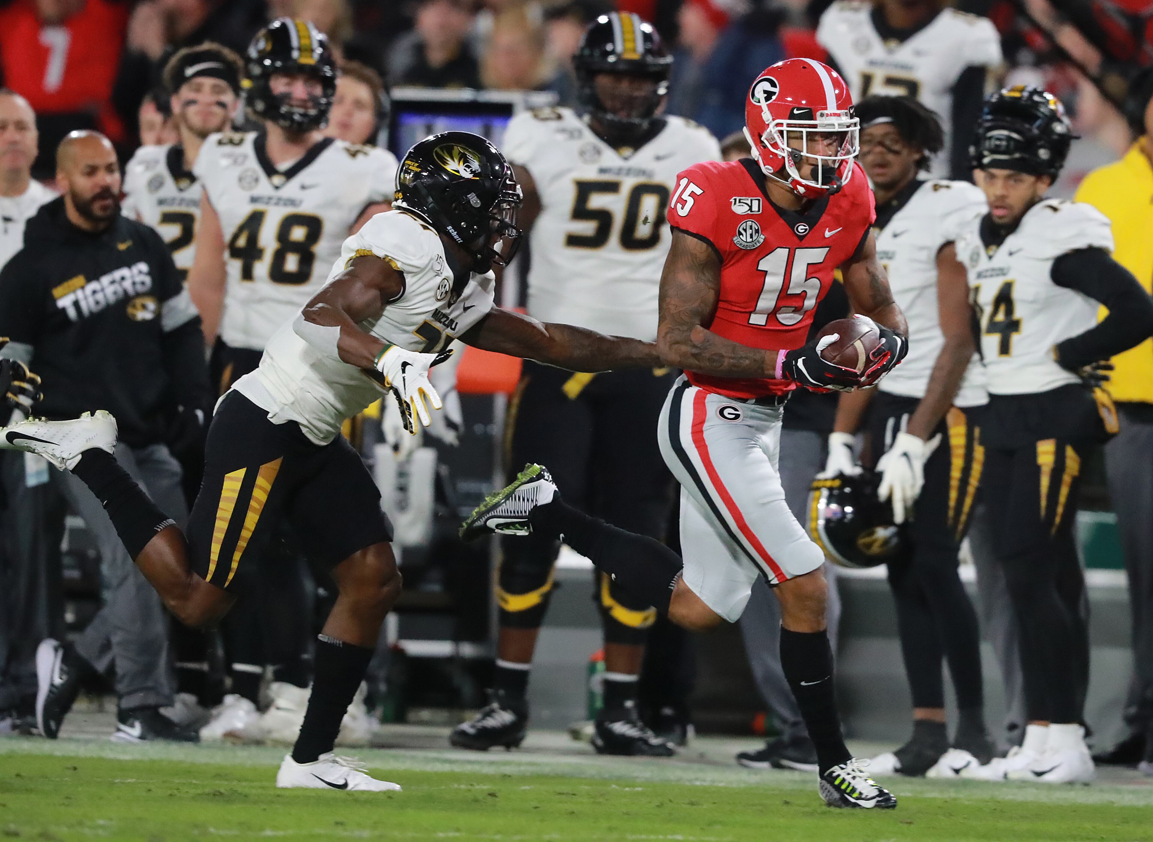 Georgia wide receiver Lawrence Cager catches a long pass against Missouri defensive back Christian Holmes during the first quarter in a NCAA college football game on Saturday, November 9, 2019, in Atlanta. Curtis Compton/ccompton@ajc.com