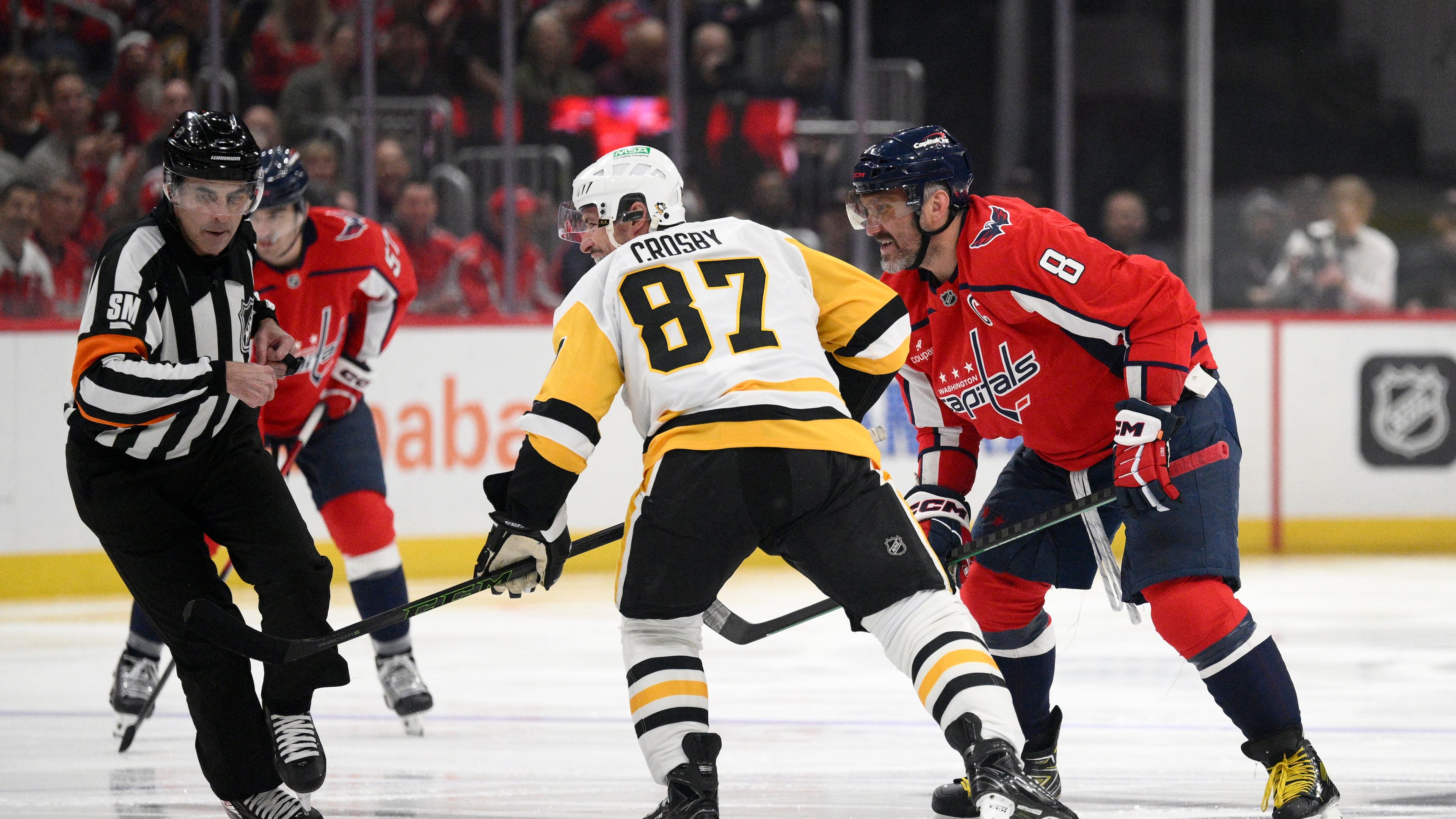Washington Capitals left wing Alex Ovechkin (8) looks on after he faced off with Pittsburgh Penguins center Sidney Crosby (87) during the first period of an NHL hockey game, Sunday, April 12, 2026, in Washington. (AP Photo/Nick Wass)