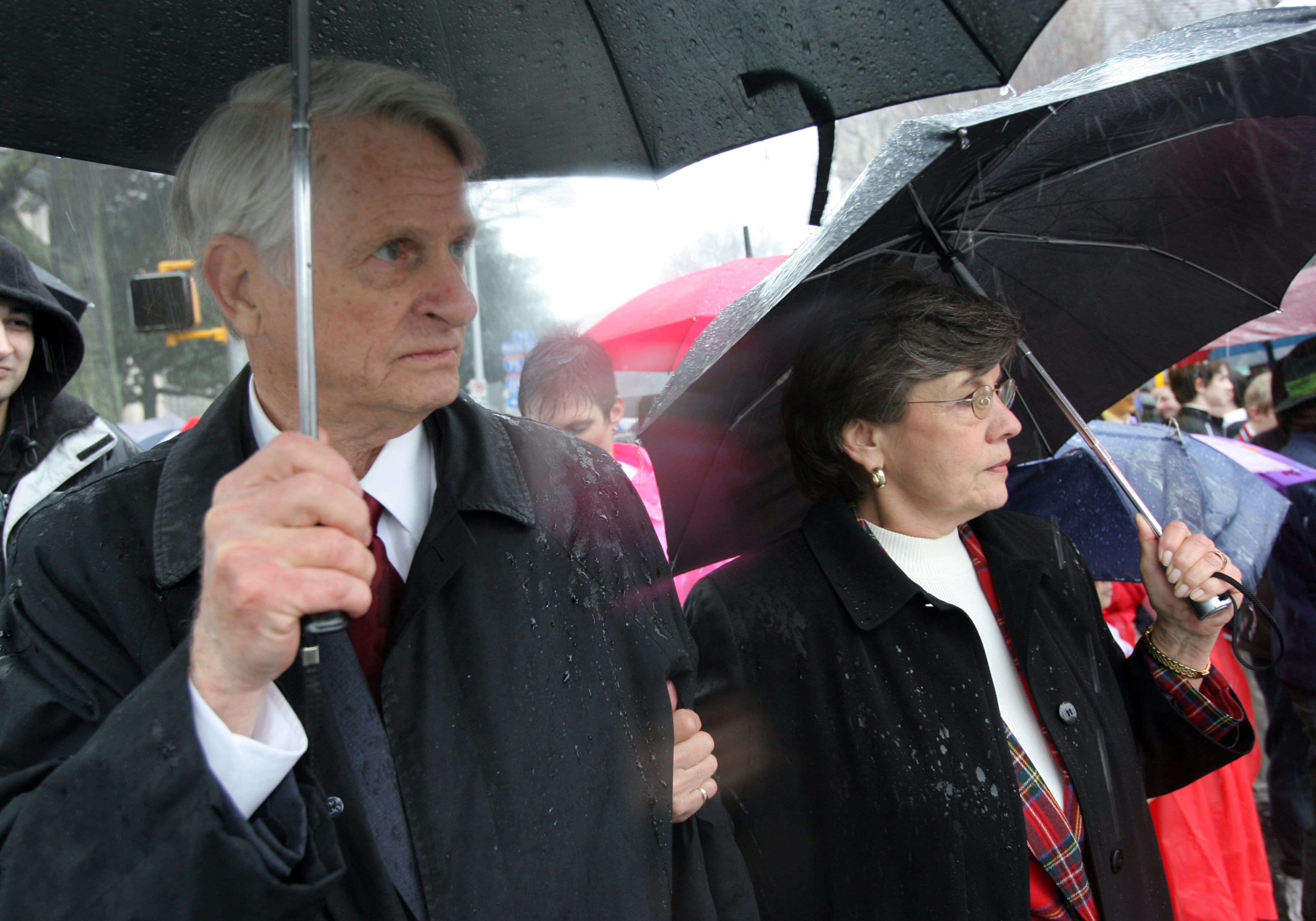 060123 ATLANTA, GA - U.S. Sen. Zell Miller (cq), left, and Georgia Right to Life President Caryl Swift (cq) lead a rain-soaked silent walk through downtown Atlanta as part of the Together for Life rally Monday at the Capitol. The annual event, sponsored by Georgia Right to Life, is a protest against legal abortions. (BEN GRAY/STAFF) ben's cell 404-964-9686