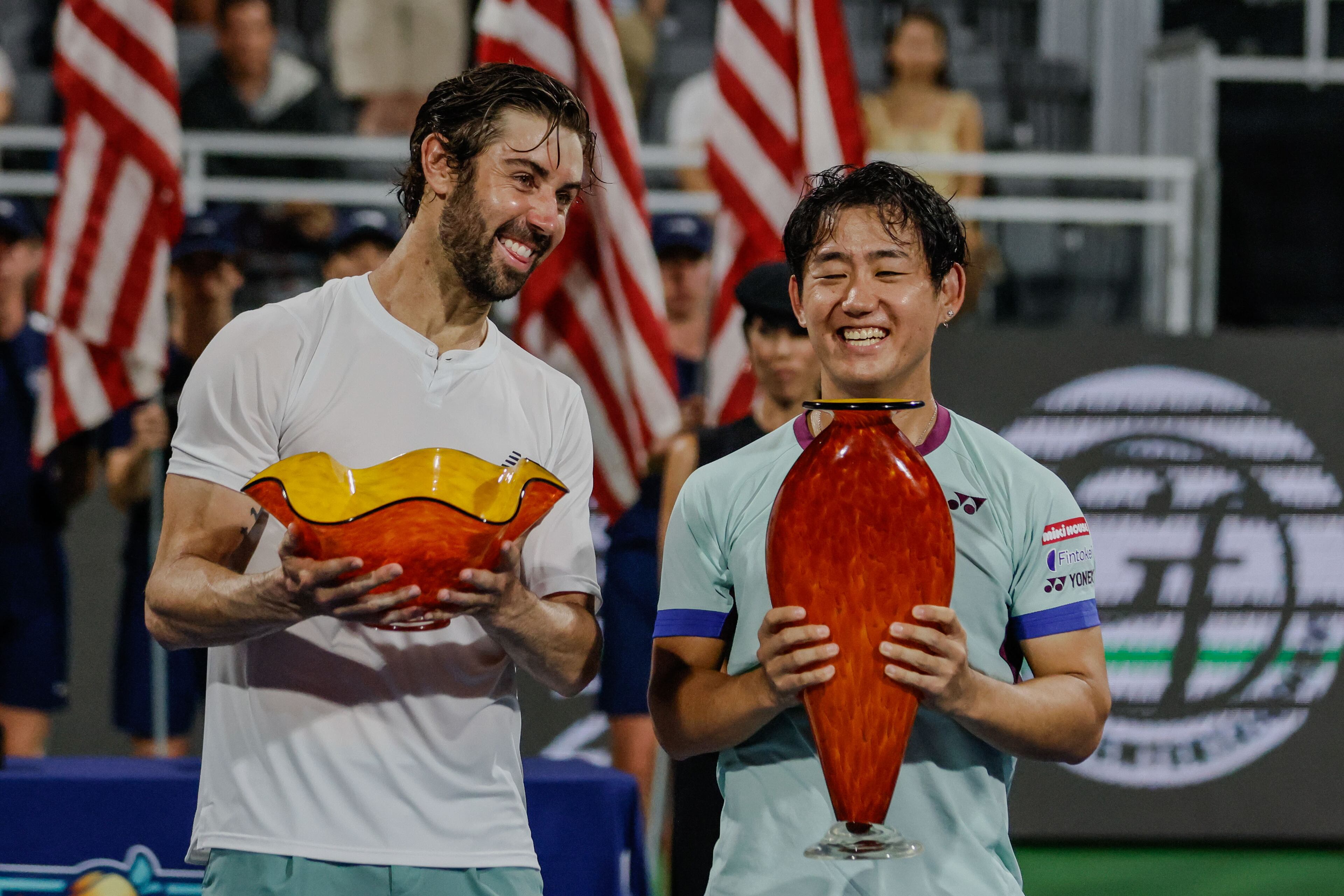 Japan’s Yoshihito Nishioka (right) smiles with Jordan Thompson after winning the championship match at the 2024 Atlanta Tennis Open at Atlantic Station on Sunday, July 28, 2024, in Atlanta.
(Miguel Martinez / AJC)
