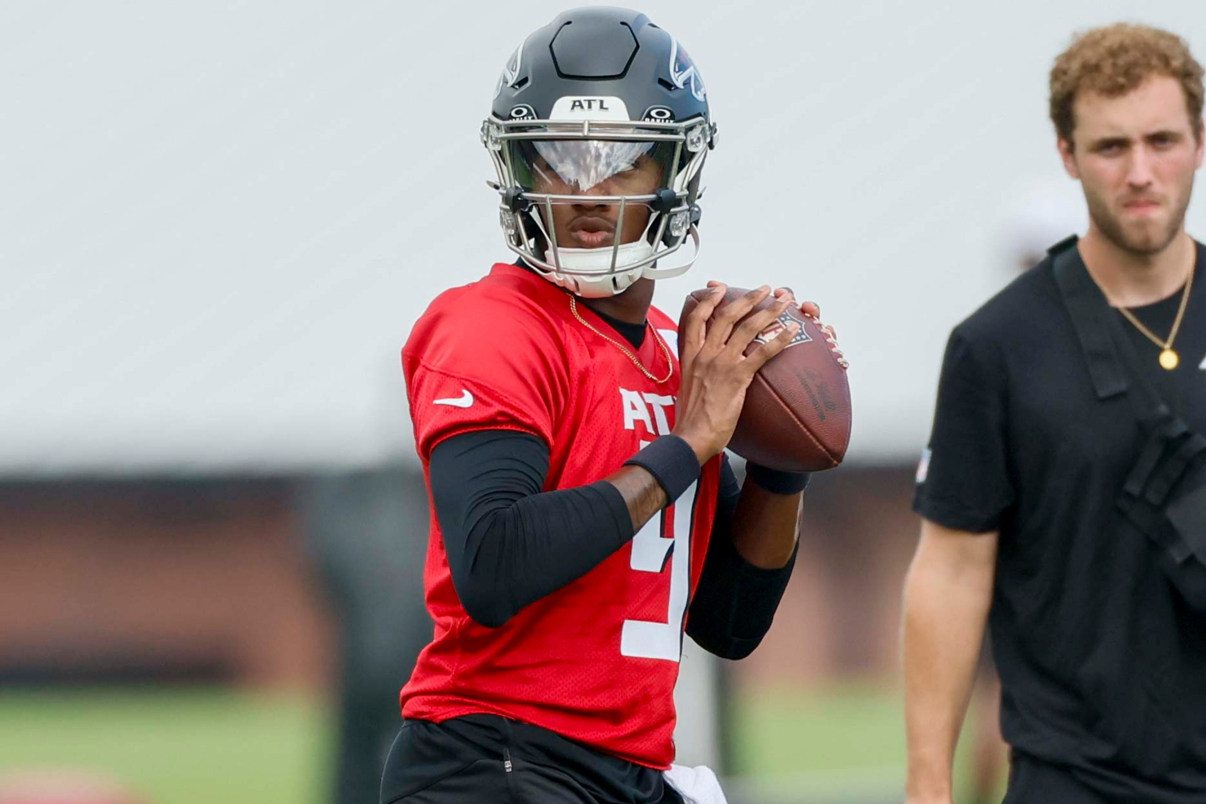 Atlanta Falcons quarterback Michael Penix Jr. attempts a pass during the first practice of training camp on Thursday, July 24, 2025, in Flowery Branch. (Miguel Martinez/AJC)