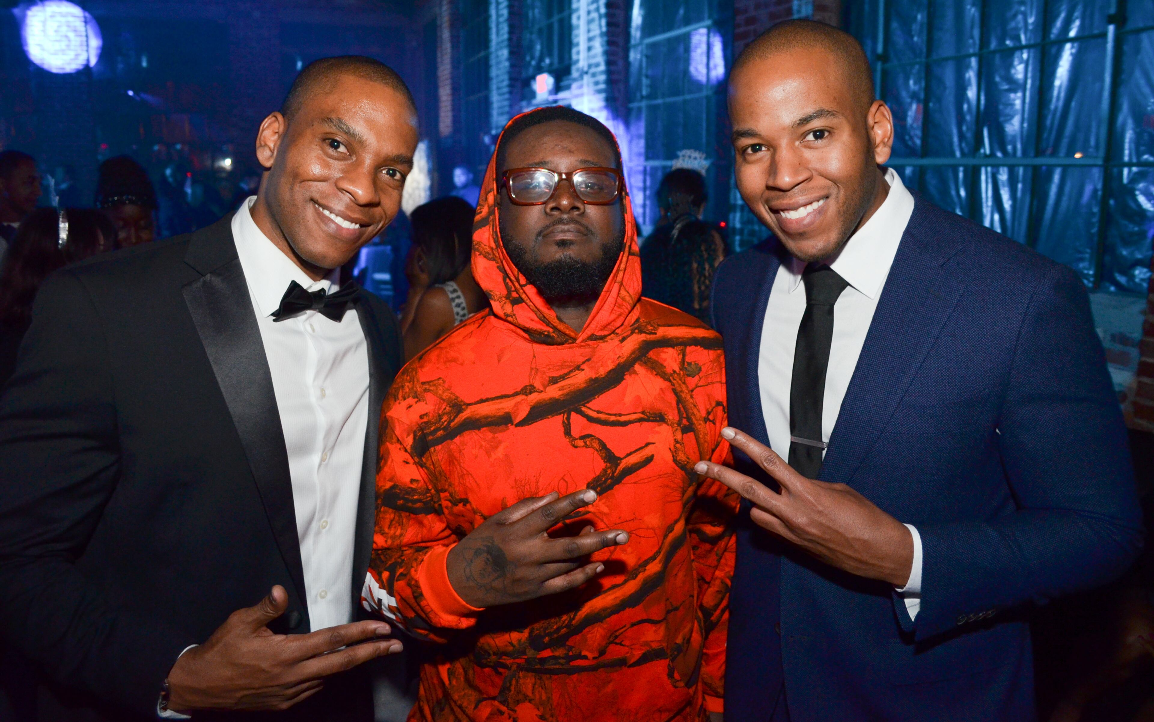 From left, GuestList co-founder Fred Smith, artist T-Pain and GuestList co-founder Andre Smith at a GuestList event.