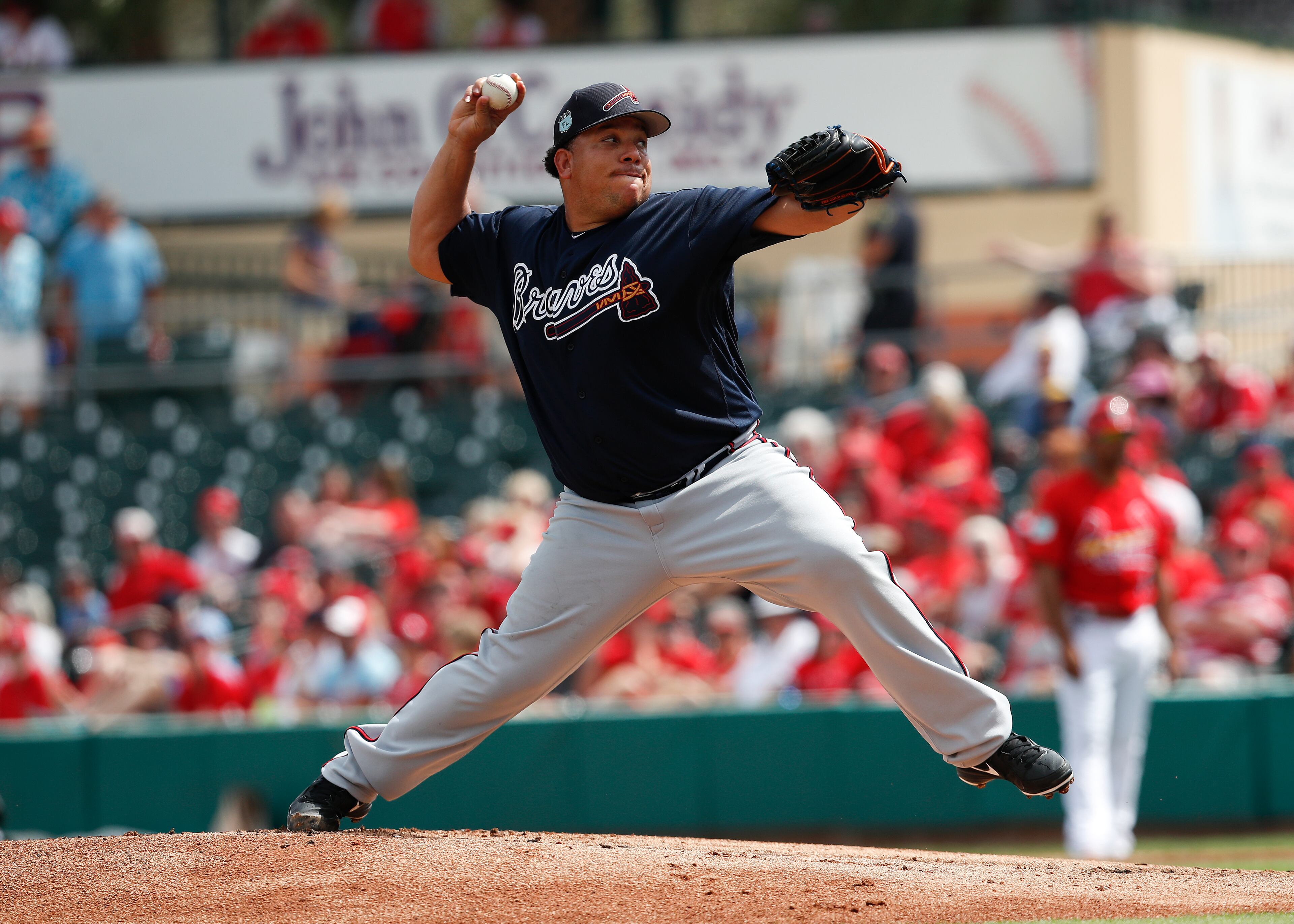 Atlanta Braves starting pitcher Bartolo Colon (40) works in the first inning of a spring training baseball game against the St. Louis Cardinals Thursday, March 2, 2017, in Jupiter, Fla. (AP Photo/John Bazemore)