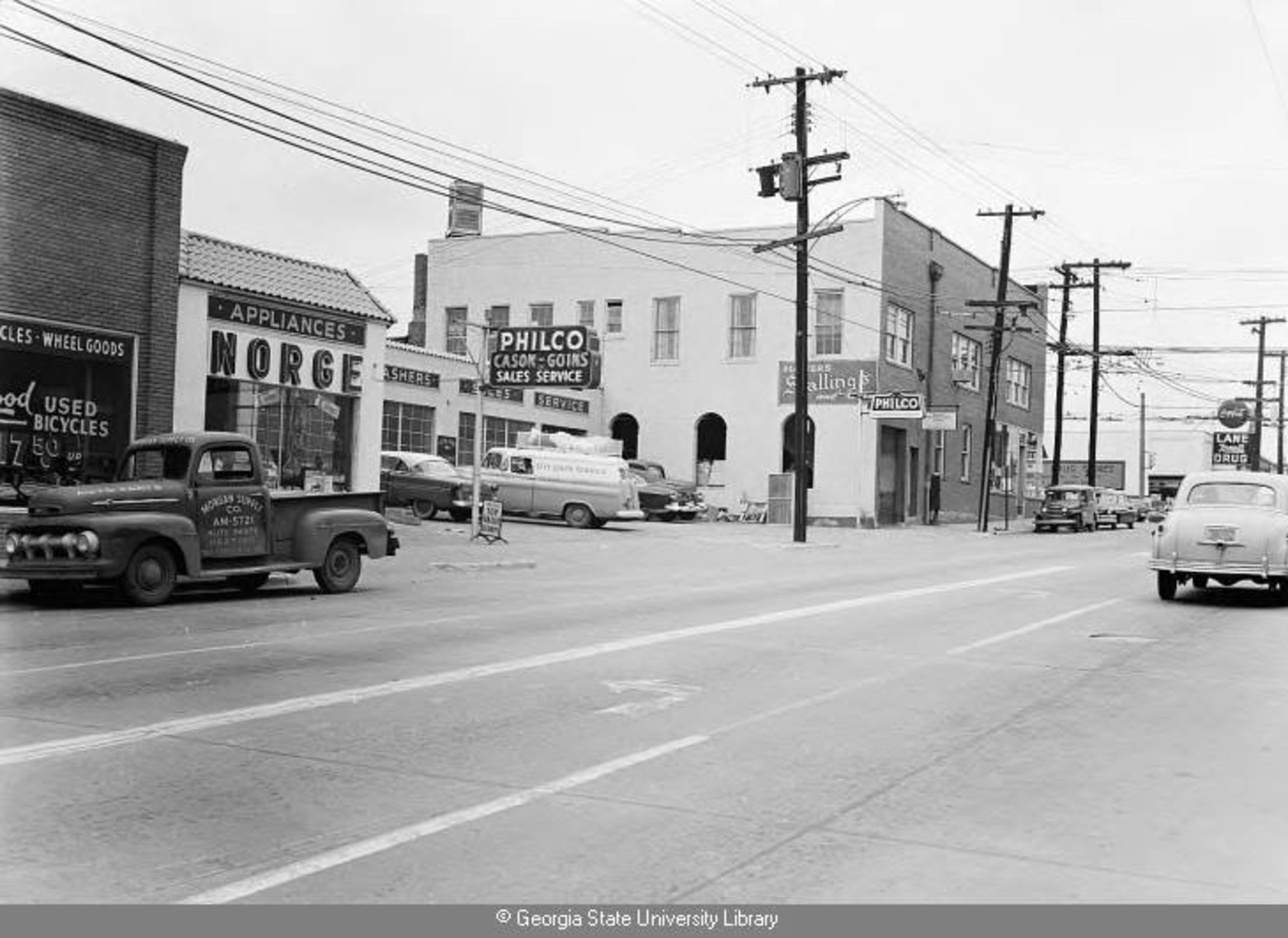 Dec. 1955 -- Businesses in Atlanta’s West End neighborhood. LANE BROS. PHOTOGRAPHIC COLLECTION / GSU