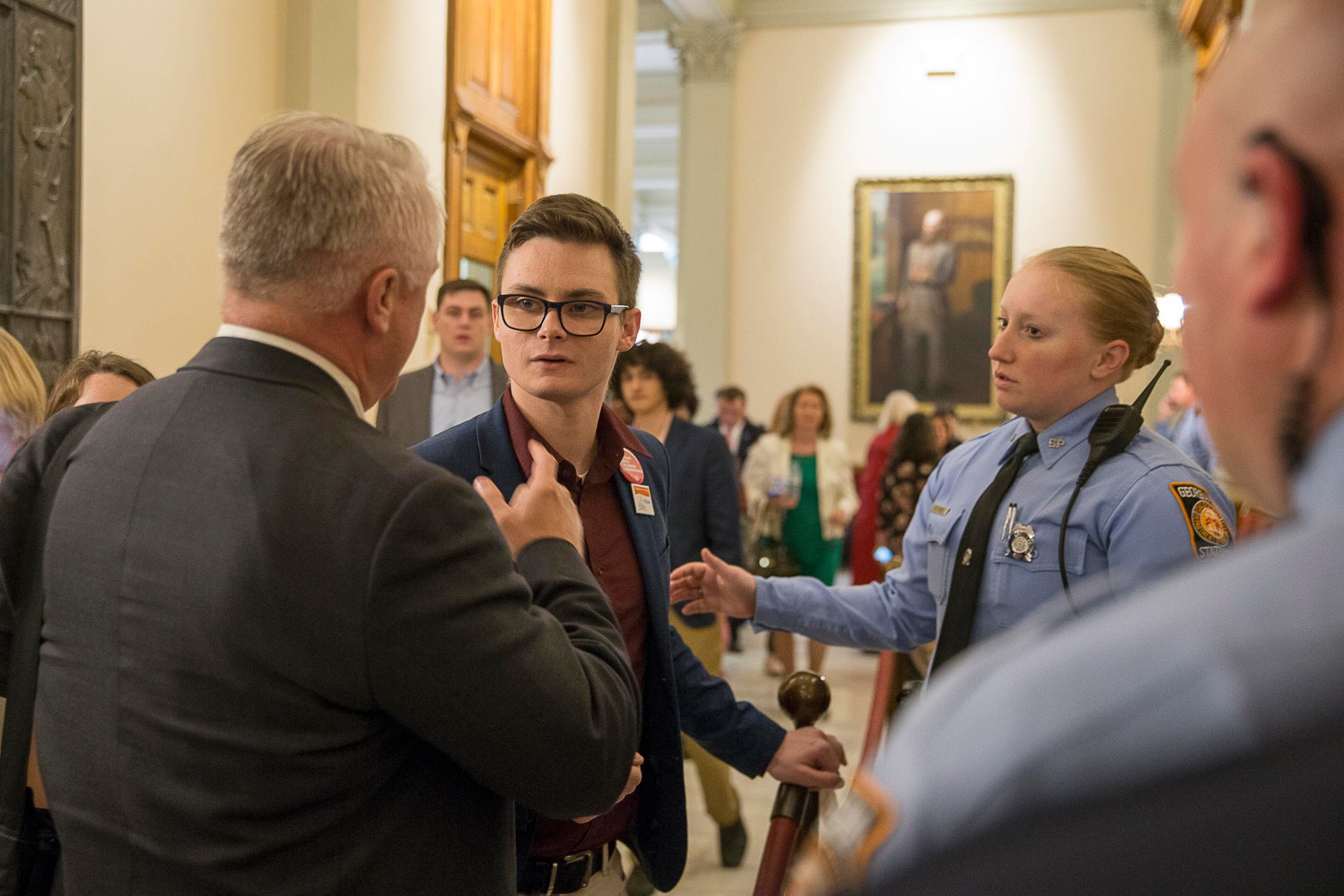 03/22/2019 -- Atlanta, Georgia -- A young man is scolded by Georgia Senator Randy Robertson (left) after making comment to the senator following the passing of HB 481 in the Senate chambers on the 35th legislative day at the Georgia State Capitol building in downtown Atlanta, Friday, March 22, 2019. HB 481 passed the Senate, 34-18. (ALYSSA POINTER/ALYSSA.POINTER@AJC.COM)