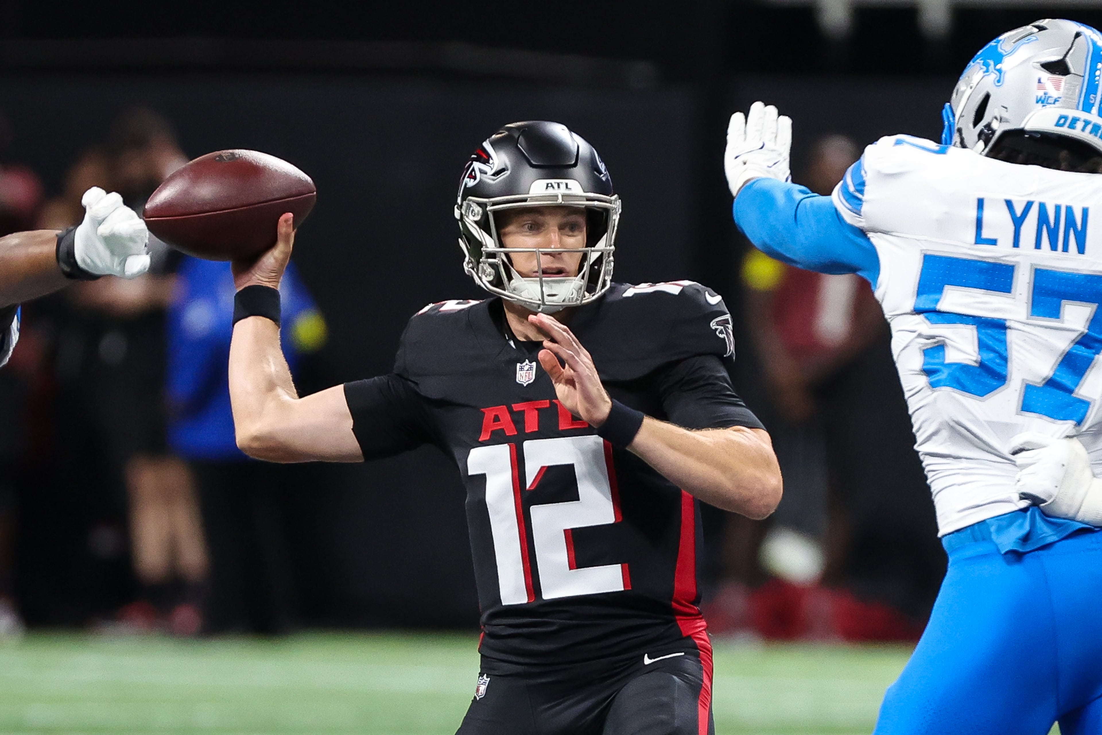 Atlanta Falcons quarterback Easton Stick (12) goes for a pass during the first half of an NFL preseason game against the Detroit Lions at Mercedes-Benz Stadium in Atlanta on Friday, August 8, 2025. (Arvin Temkar / AJC)
