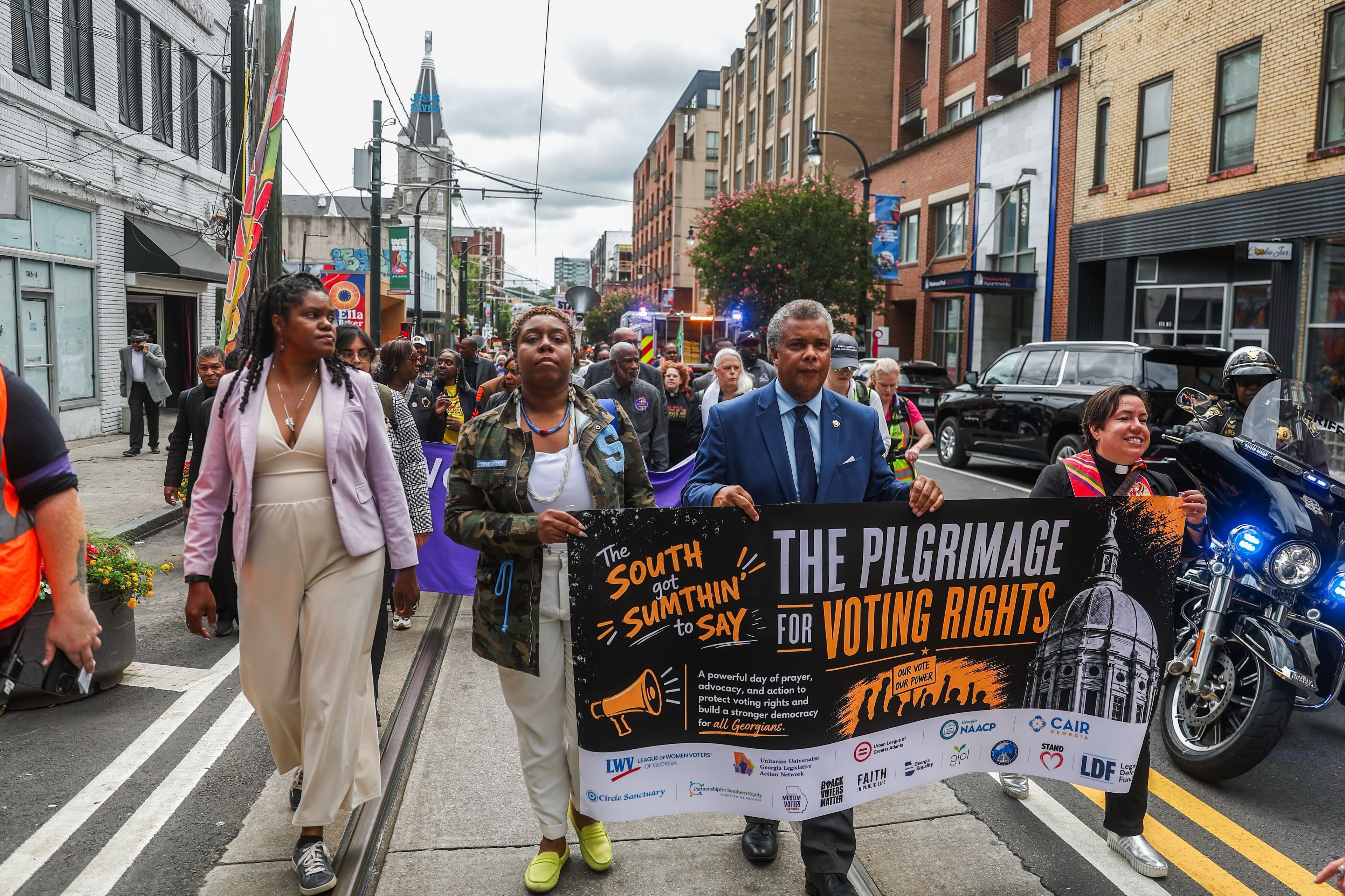 Protesters march to the Georgia Capitol on Wednesday, June 17, 2026. (Abbey Cutrer/AJC)