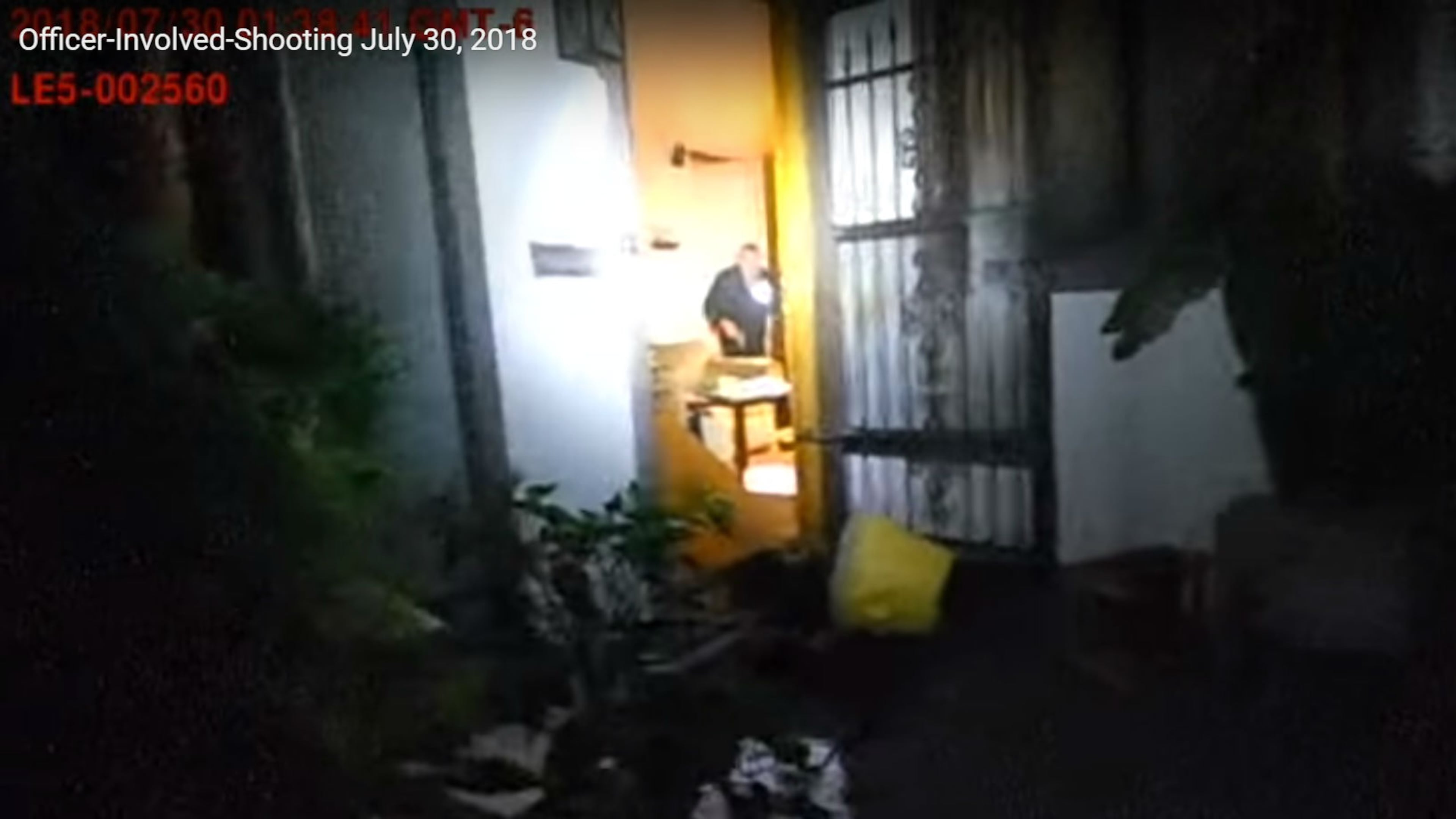 Body camera footage recorded by Aurora police Officer Drew Limbaugh shows Army veteran Richard "Gary" Black Jr., 73, in his home moments before he was fatally shot by Limbaugh. Officers responding to Black's home the morning of July 30, 2018, came upon Black, a decorated Vietnam veteran, holding a flashlight and a handgun less than a minute after Black shot and killed Dejon Harper, 26, an intruder who kicked in the front door and attacked Black's 11-year-old grandson in the home's bathroom. Limbaugh, who opened fire after Black failed to heed officers' warnings to drop the weapon, seen in Black's right hand above, has been cleared of criminal wrongdoing.