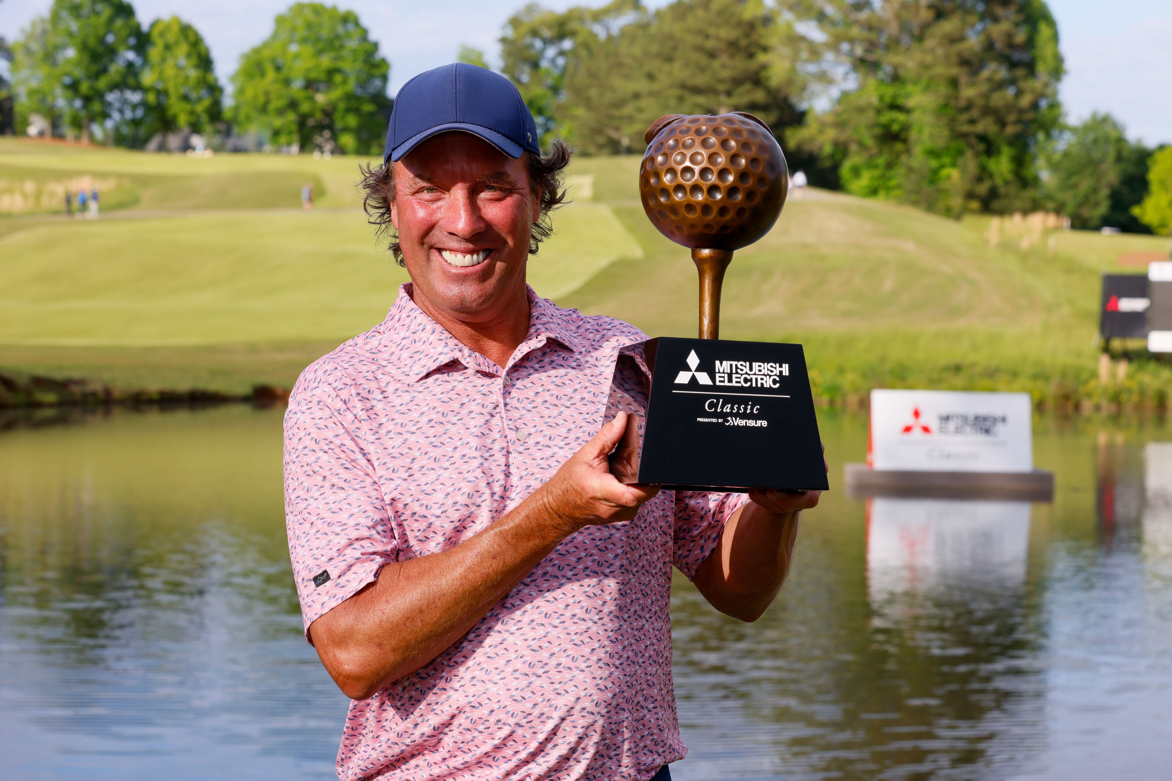 Stephen Ames shows the trophy after winning the Mitsubishi Classic senior golf tournament at TPC Sugarloaf on Sunday, April 28, 2024, in Duluth, Ga.
(Miguel Martinez / AJC)