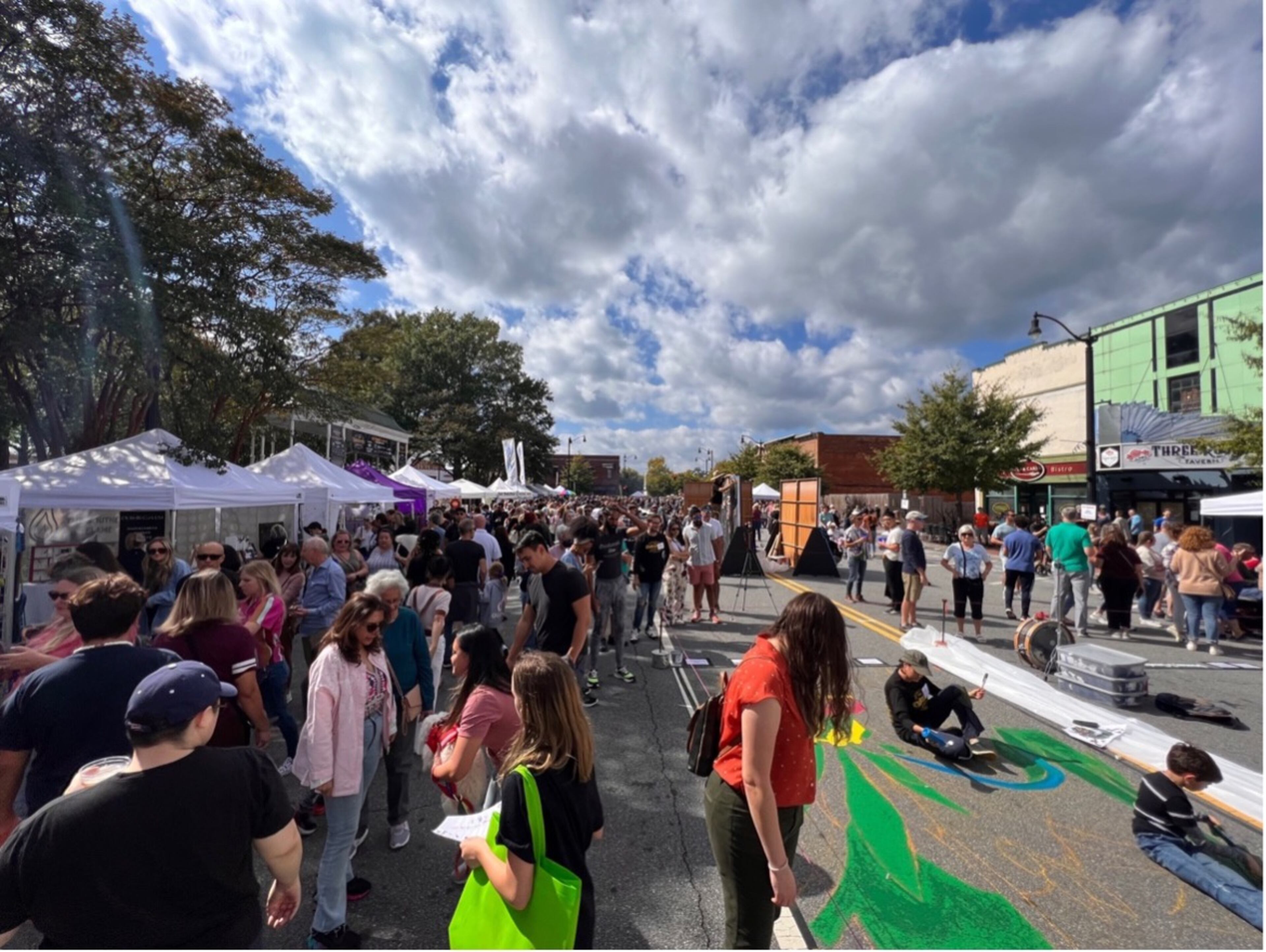 Crowds enjoy pavement art, crafts and food vendors at Marietta’s two-day Chalktoberfest festival. (Photo Courtesy of Jen Curtis/Fresh Take Georgia)