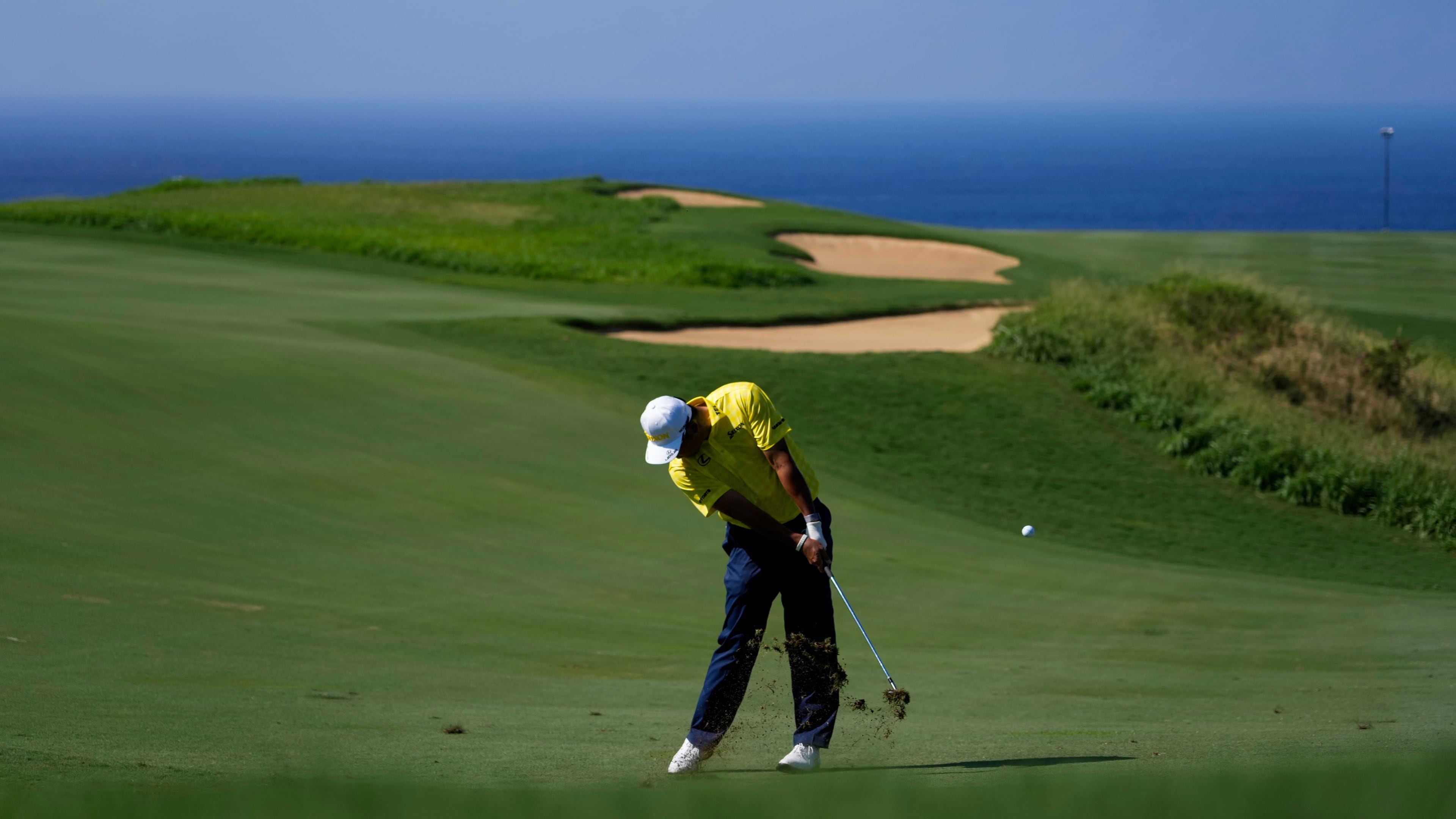 FILE - Hideki Matsuyama, of Japan, hits on the 13th hole during the final round of The Sentry golf event, Jan. 5, 2025, at Kapalua Plantation Course, in Kapalua, Hawaii. (AP Photo/Matt York, File)
