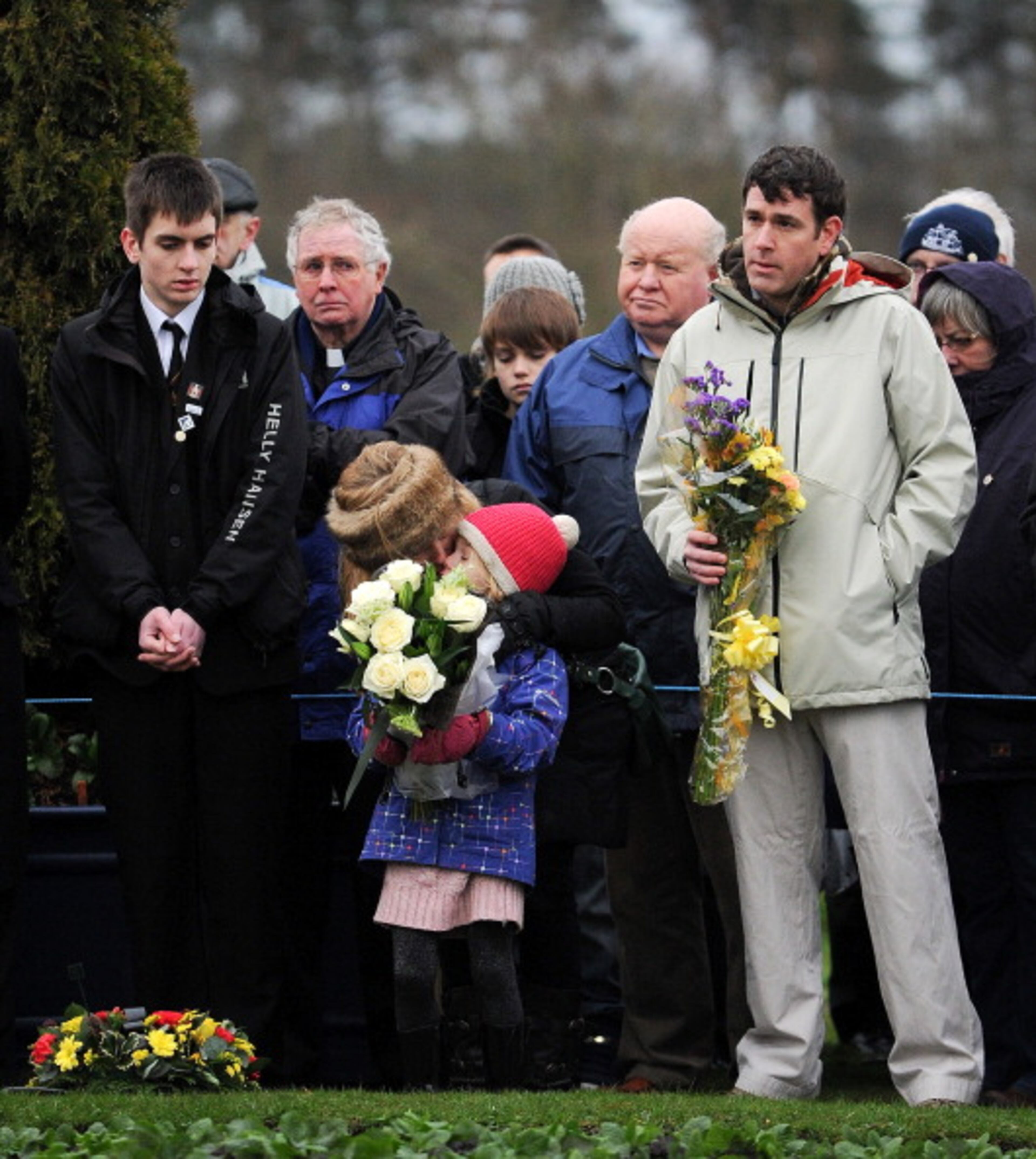 LOCKERBIE, SCOTLAND - DECEMBER 21: Families, relatives and dignitaries gather to pay their respects at the memorial service in Dryfesdale cemetery to commemorate the 25th anniversary of the air disaster on December 21, 2013 in Lockerbie, Scotland. Pan Am Flight 103 exploded over Lockerbie on December 21st, 1988, killing all those on board and a further eleven on the ground. (Photo by Ian Forsyth/Getty Images)