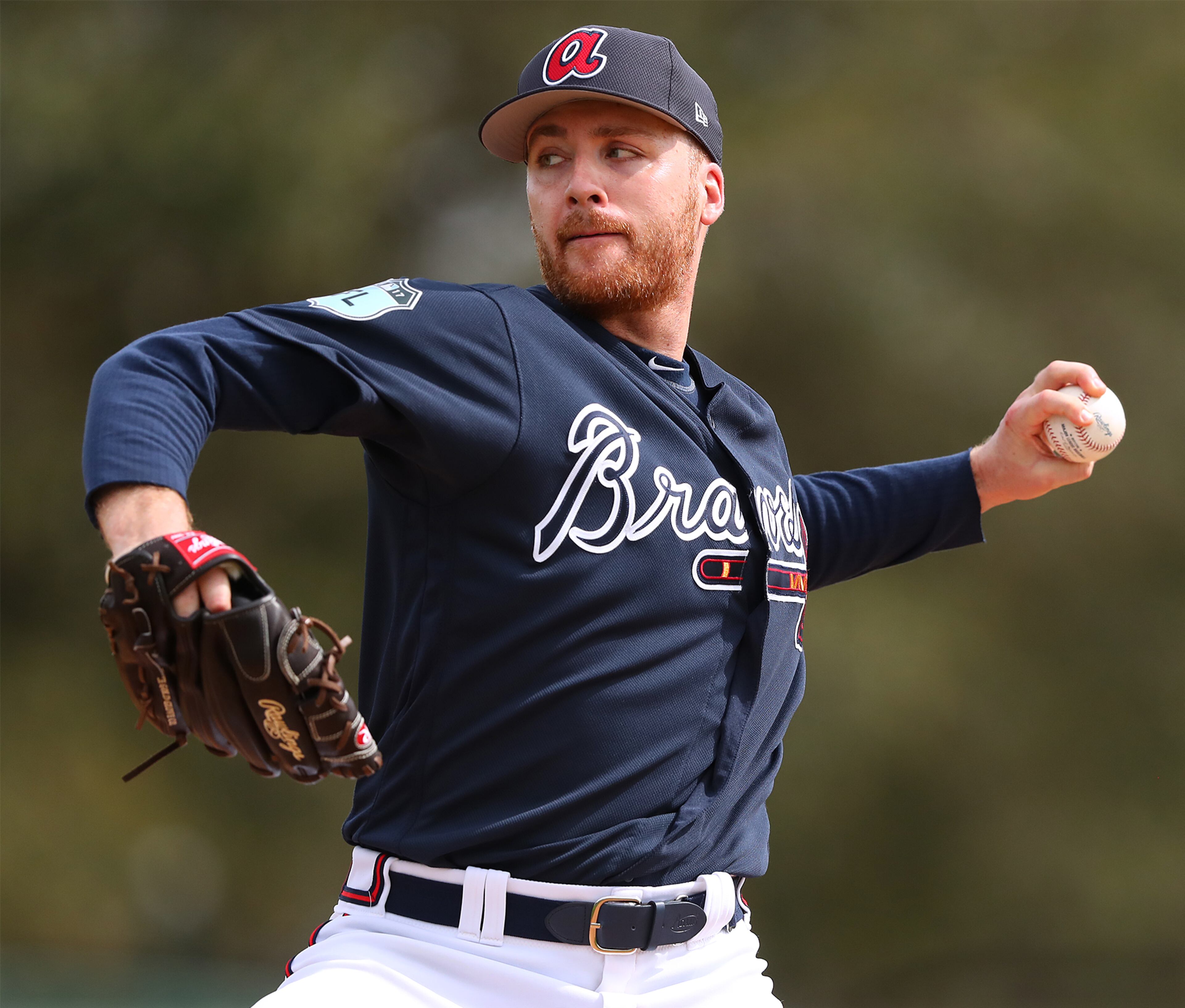 Lefthander Eric O'Flaherty delivers a pitch during Tuesday's batting practice session.